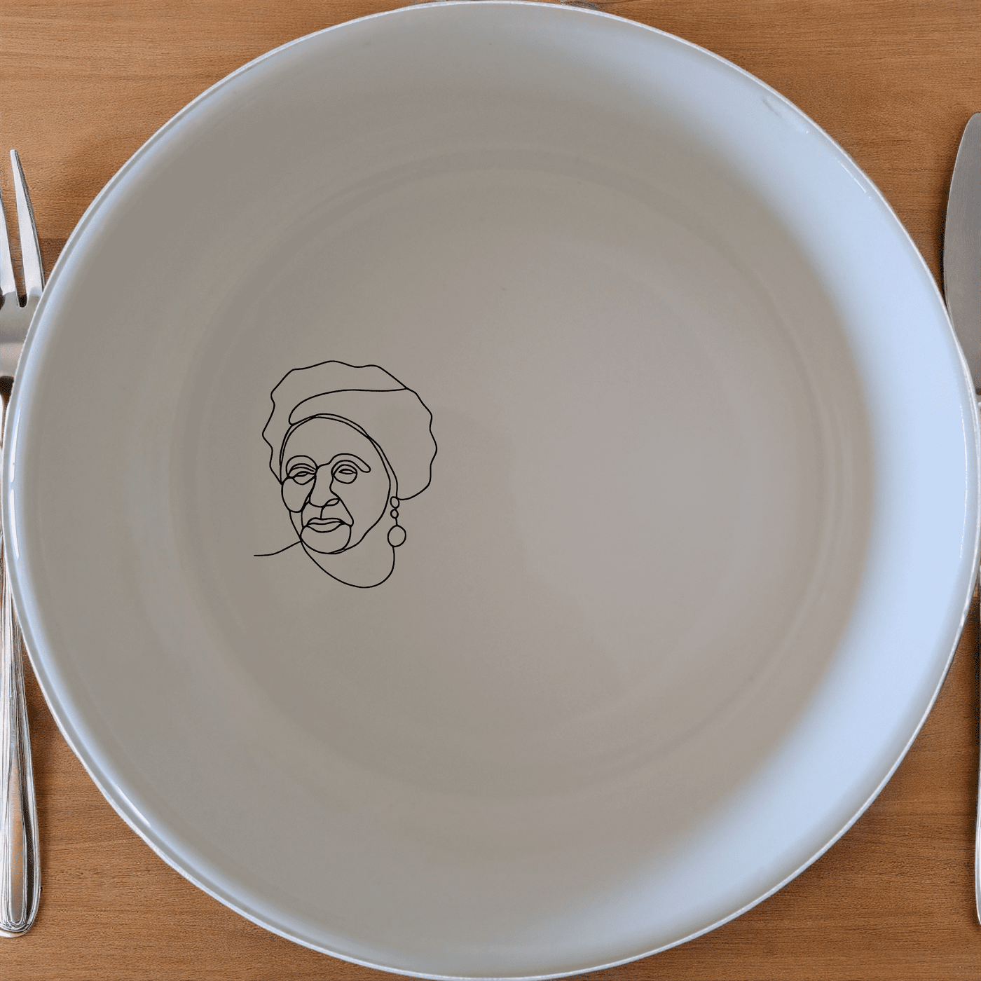 The Face Of Old African Woman Bowl Set of 4 features a striking silhouette design, perfect for adding a touch of cultural elegance to your dining experience.