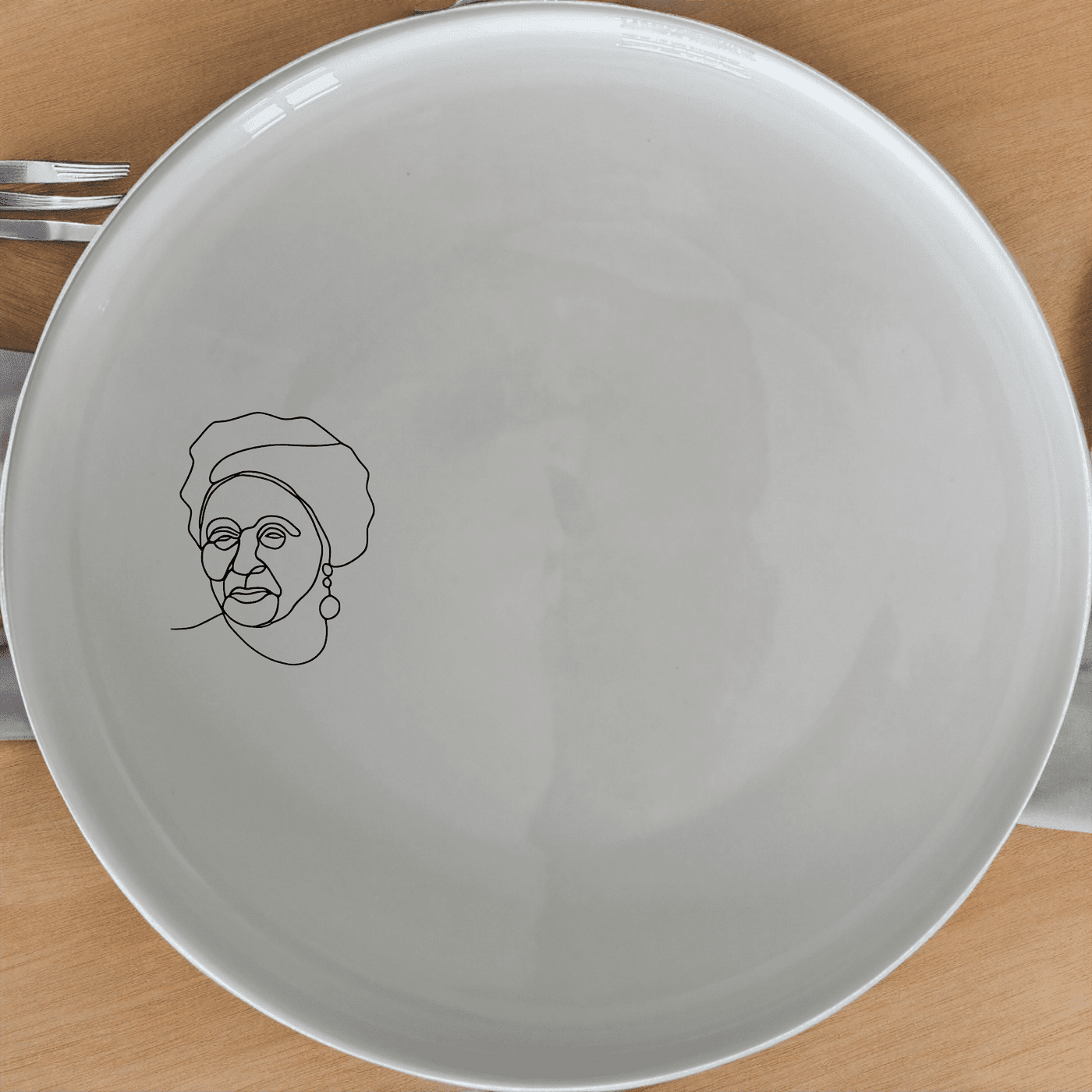 The Face Old African Woman Dinner Plate Set of 4 adds a unique and cultural touch to your dining experience with its elegant design.