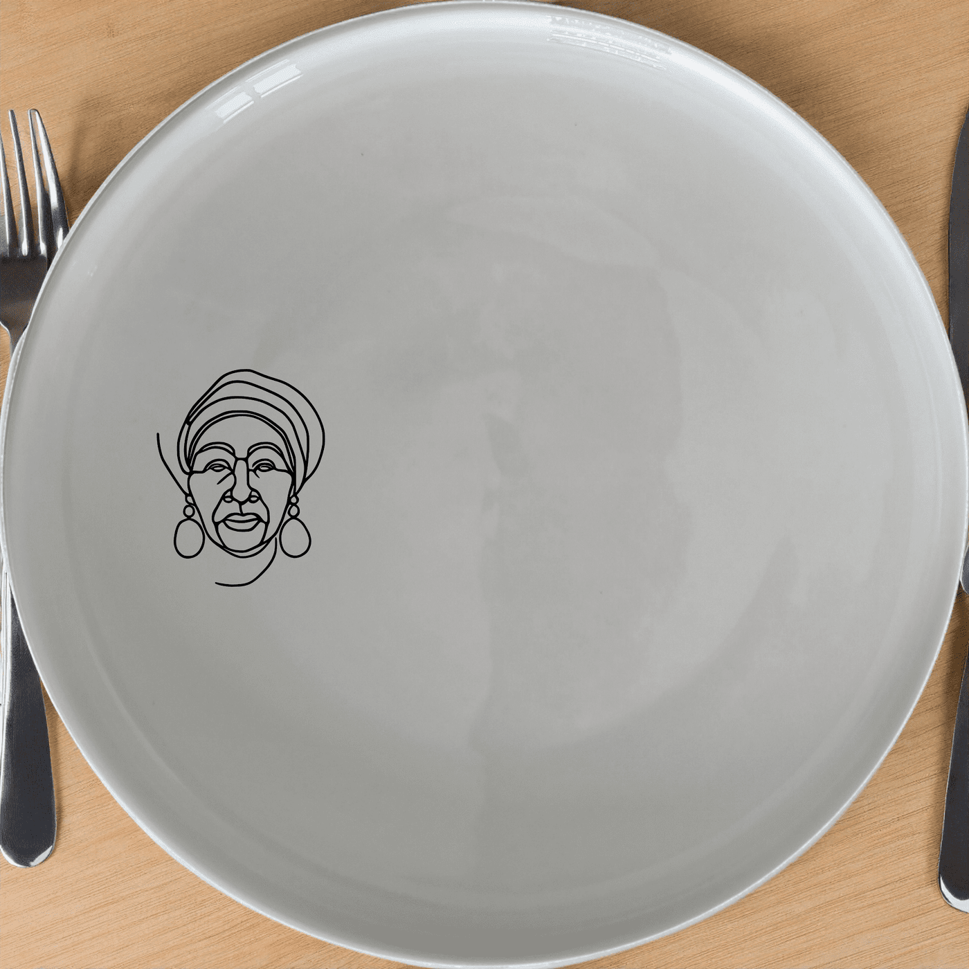 The Face Of Old African Woman Dinner Plate Set of 4 features a striking portrait design, perfect for adding cultural flair to your dining table.