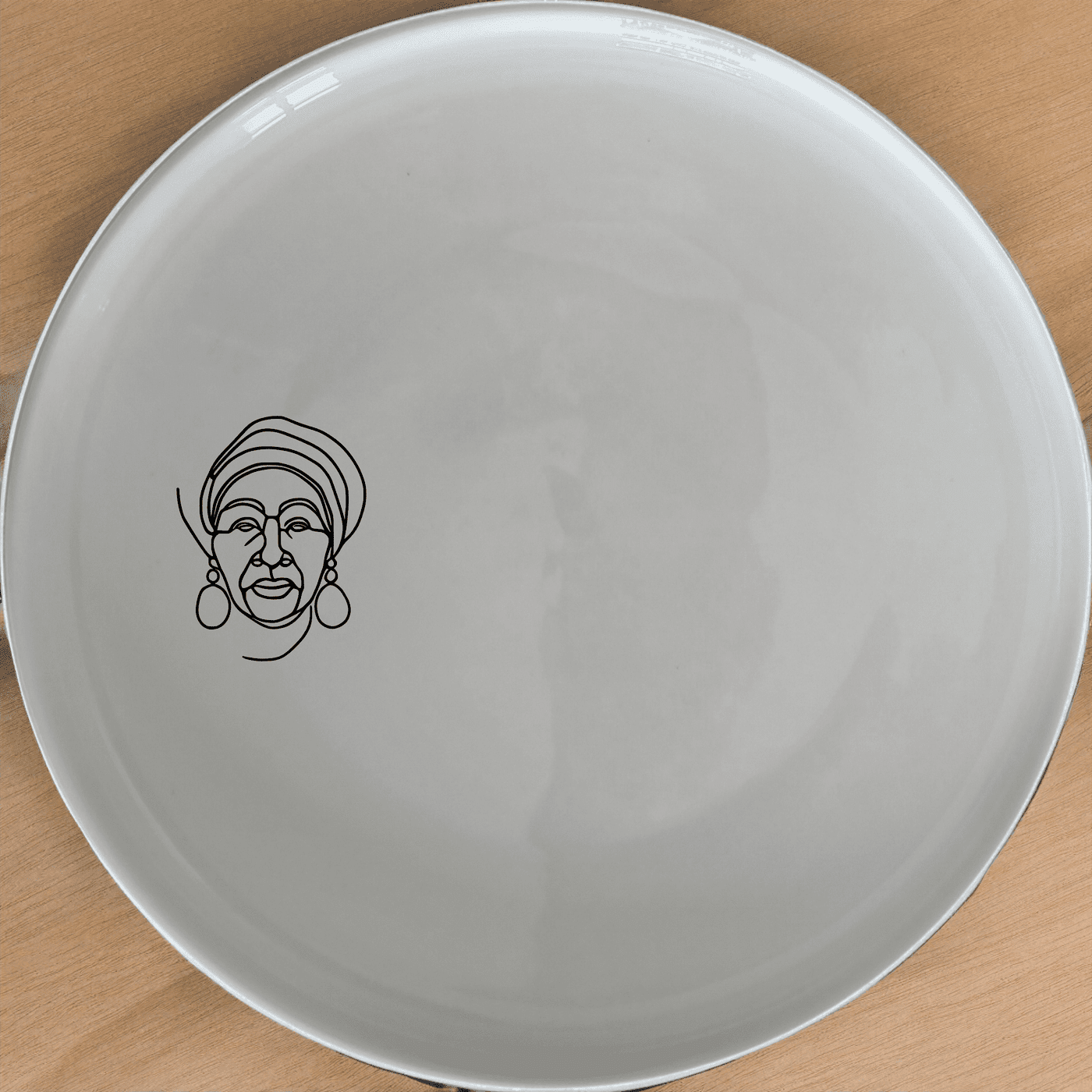 The Face Old African Woman Side Plate Set of 4 brings a unique and culturally inspired design to your dining table, perfect for adding a touch of heritage to any meal.