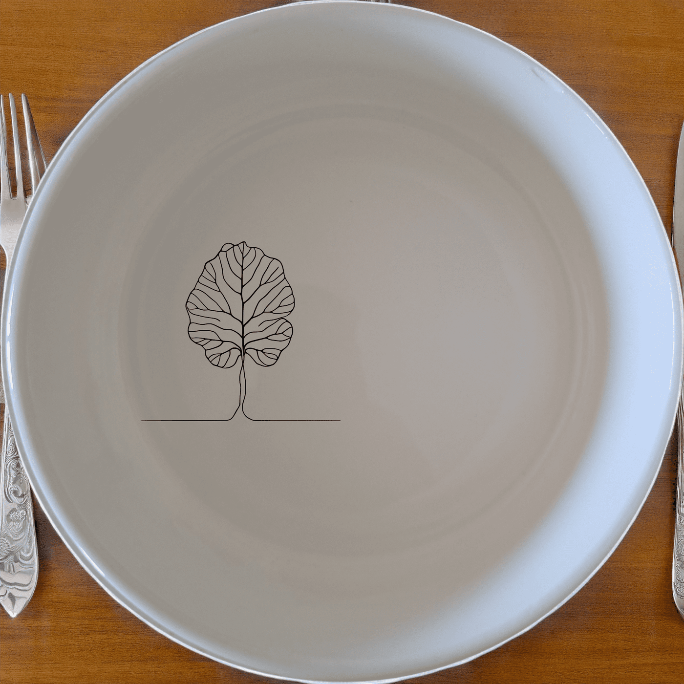 The Fiddle Leaf Bowl Set of 4 combines minimalist design with modern aesthetics, perfect for everyday use or special occasions.