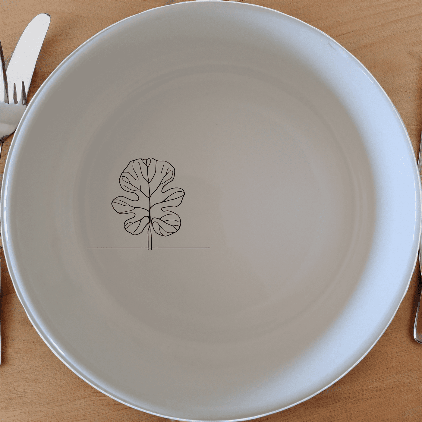 The Fiddle Leaf Bowl Set of 4 combines minimalist design with nature-inspired elegance, perfect for everyday use or special occasions.