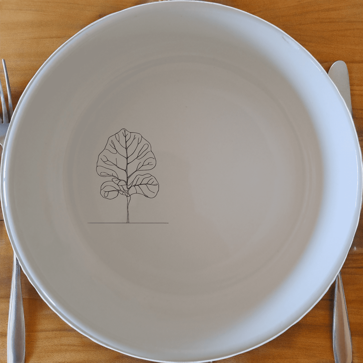 The Fiddle Leaf Bowl Set of 4 combines modern design with timeless elegance, perfect for any dining occasion.