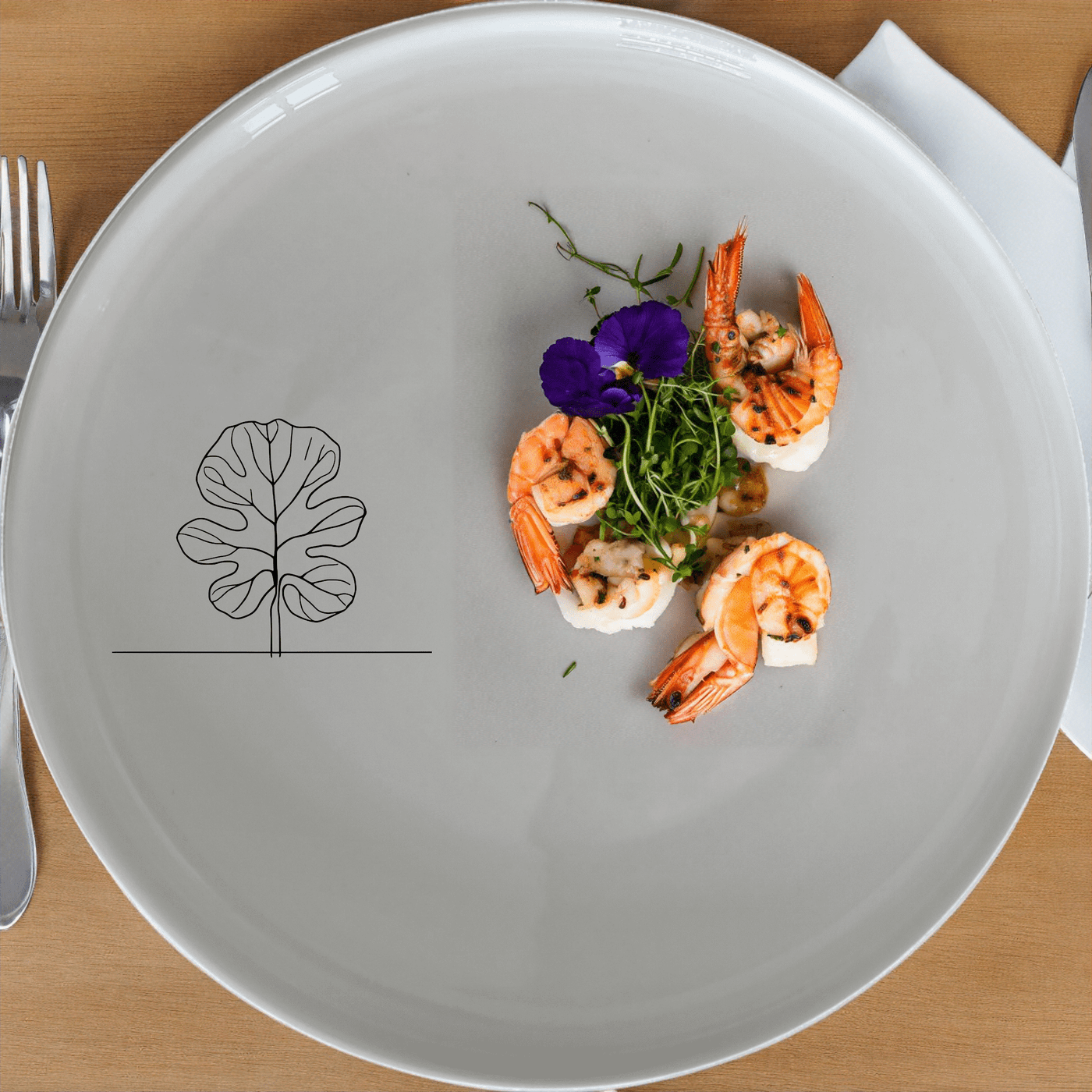 The Fiddle Leaf Side Plate Set of 4 features a minimalist design with an elegant leaf motif, perfect for modern dining.