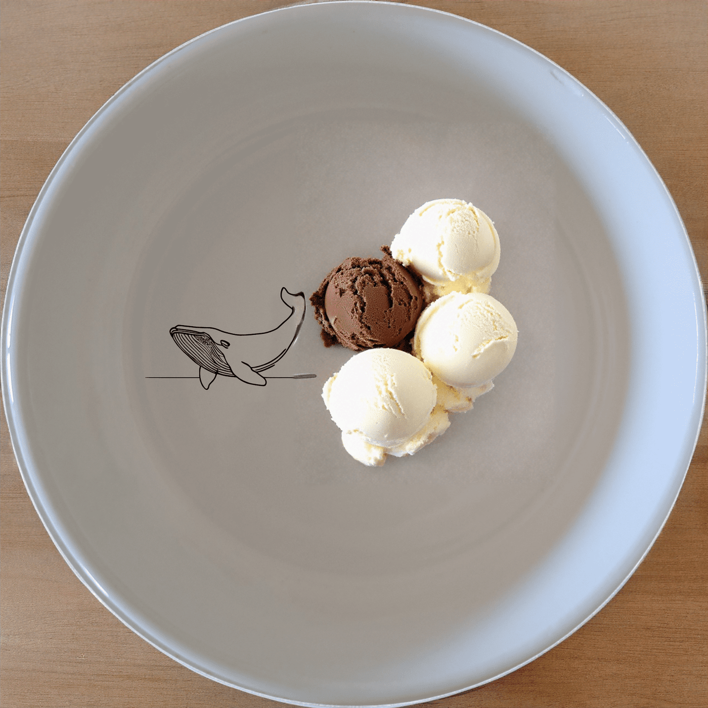 The Floating Breaching Whale Bowl Set of 4 features minimalist whale silhouettes for a modern, nature-inspired touch to your table setting.