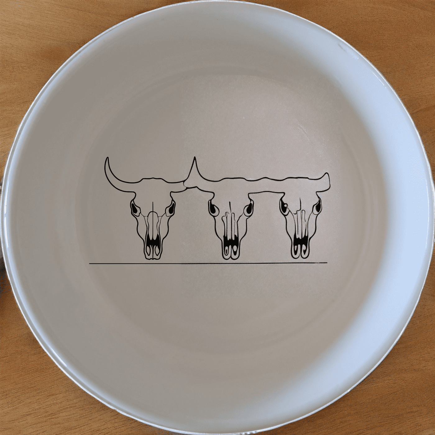 Front Facing Cow Skull Bowl Set of 4 offers a unique and stylish addition to your dining collection, perfect for everyday use or special occasions.
