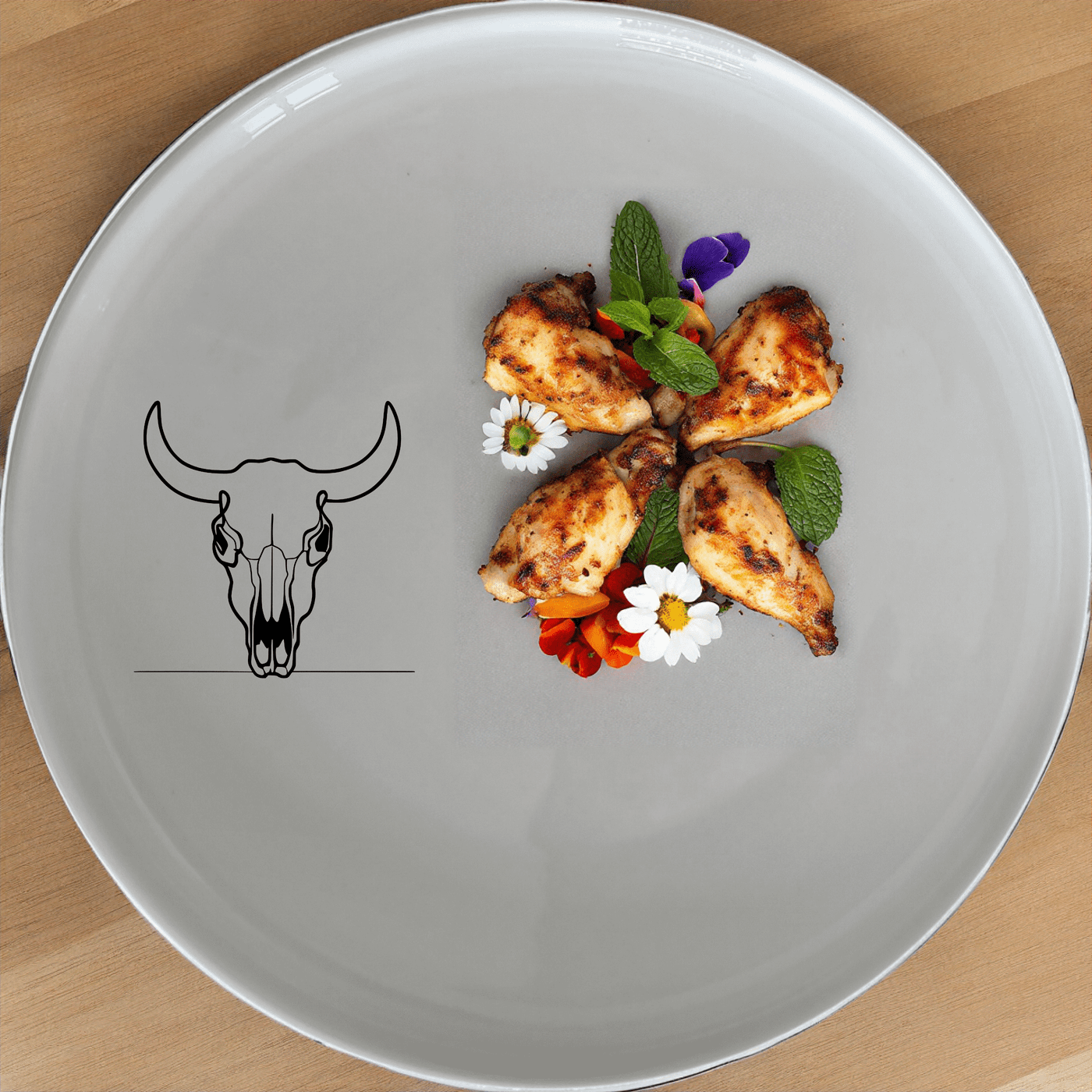 The Frontfacing Cow Skull Dinner Plate Set of 4 adds a bold, artistic touch to your dining experience with its striking skull design.