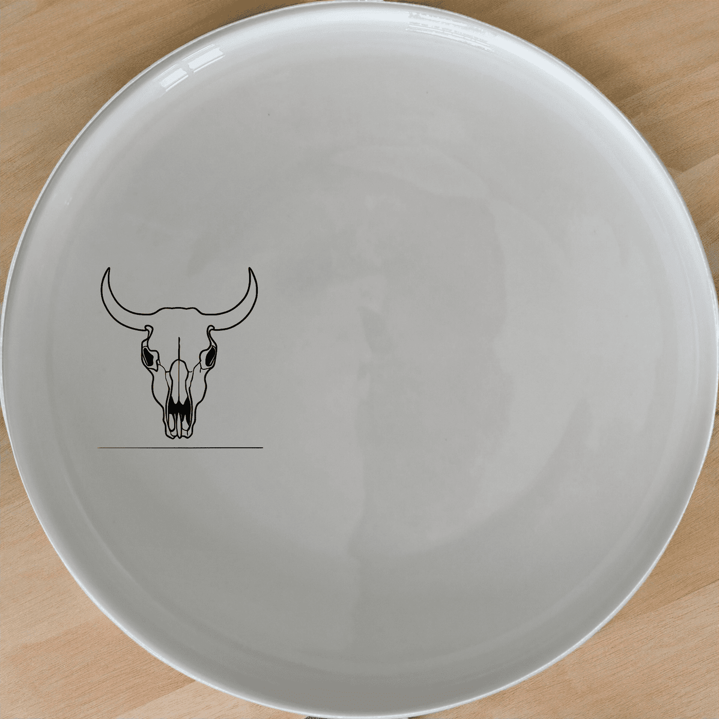 The Front Facing Cow Skull Dinner Plate Set of 4 adds a bold, artistic touch to your dining experience with its striking design.