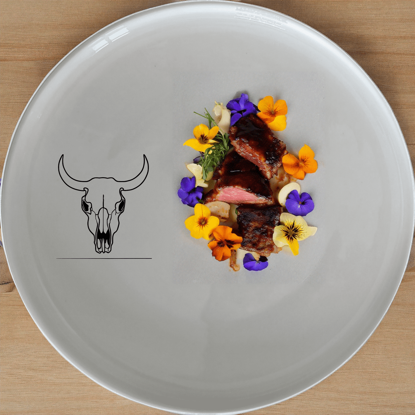 The Frontfacing Cow Skull Side Plate Set of 4 adds a bold, artistic touch to your dining experience with its striking skull design.