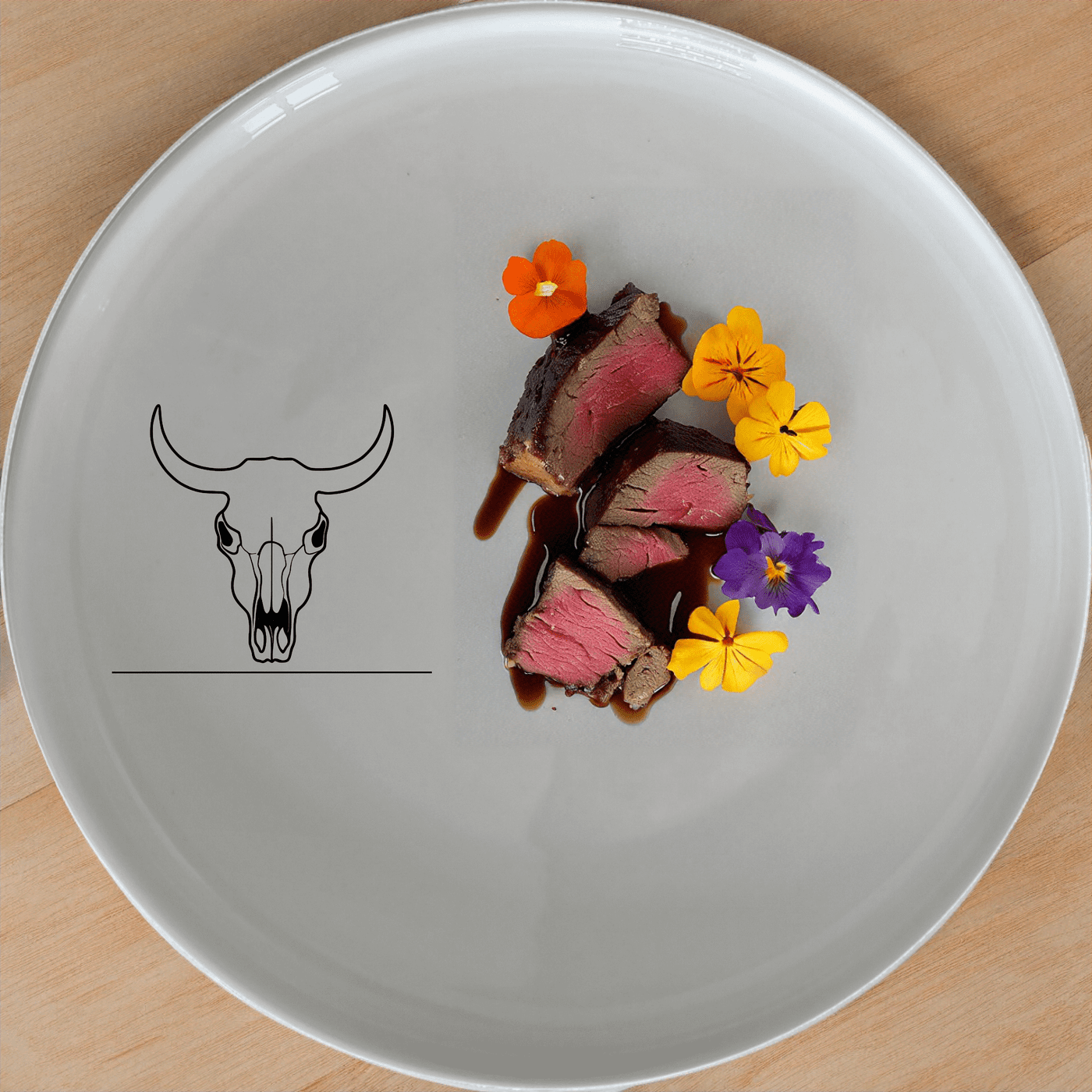 Frontfacing Cow Skull Side Plate Set of 4 is a stylish and modern addition to any dining table, featuring a sleek and minimalist design.