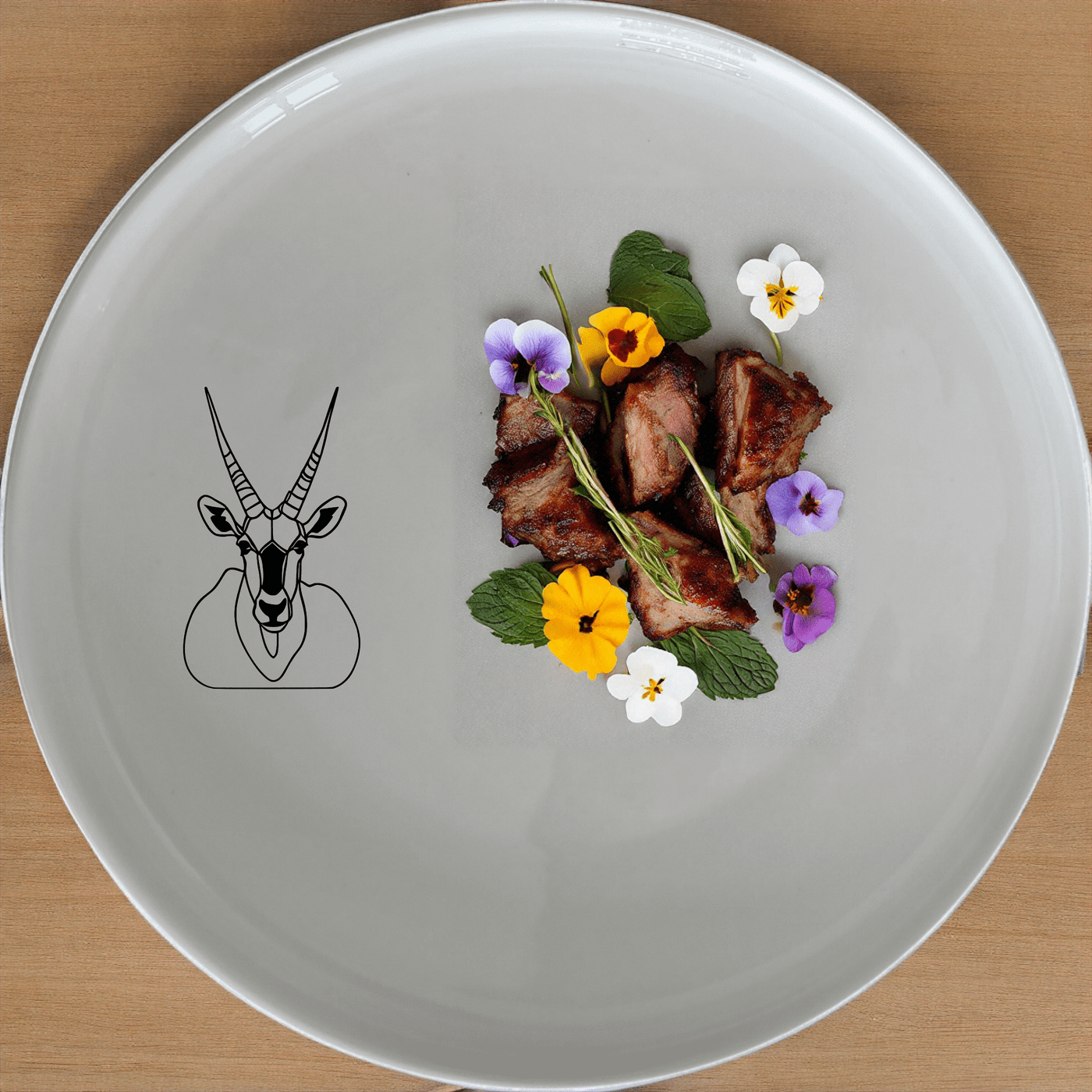 The Gemsbok Bust Side Plate Set of 4 features a striking silhouette design, perfect for modern and minimalist dining settings.