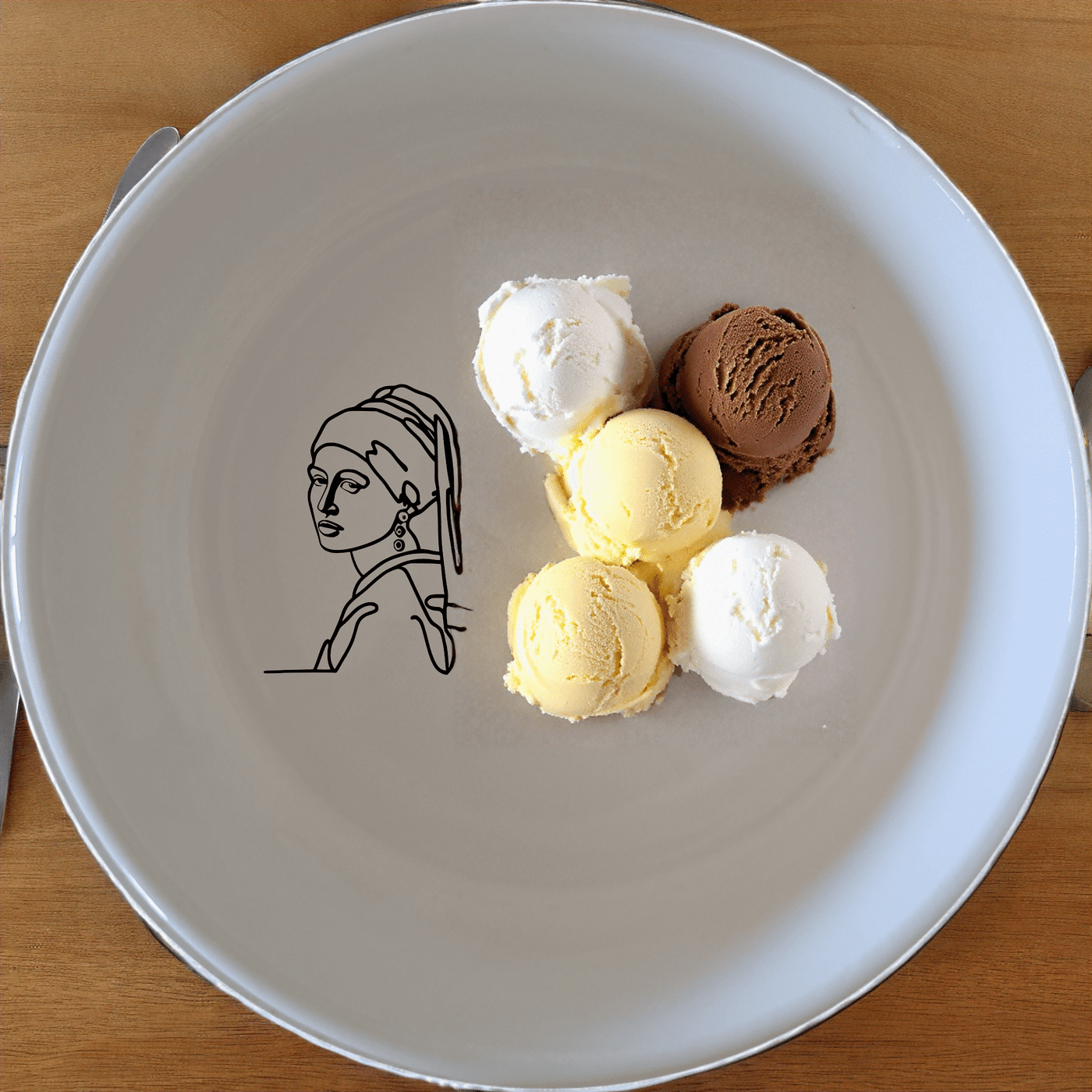 The Girl Pearl Earring Bowl Set of 4 features a minimalist design inspired by classic art, perfect for modern dining and everyday use.