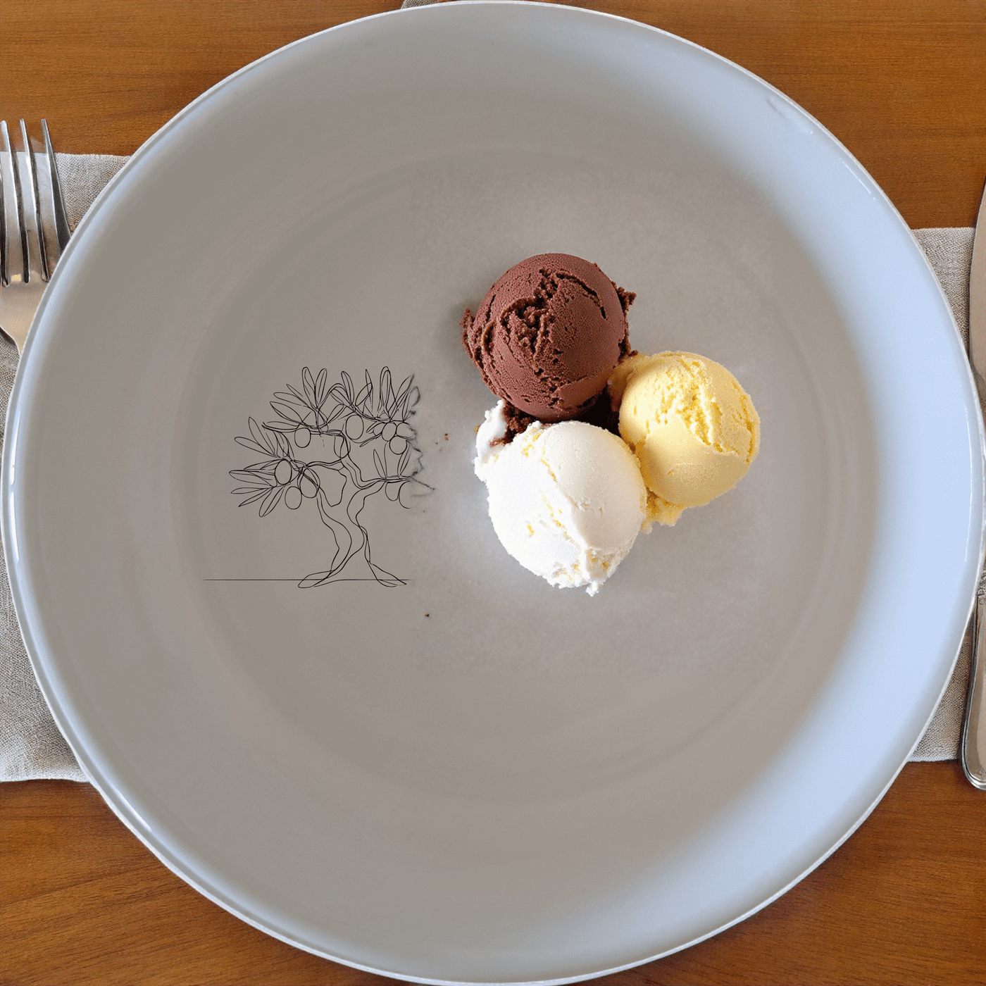 The Grecian Olive Tree Bowl Set of 4 features a minimalist olive tree design, perfect for adding a touch of Mediterranean elegance to your dining experience.