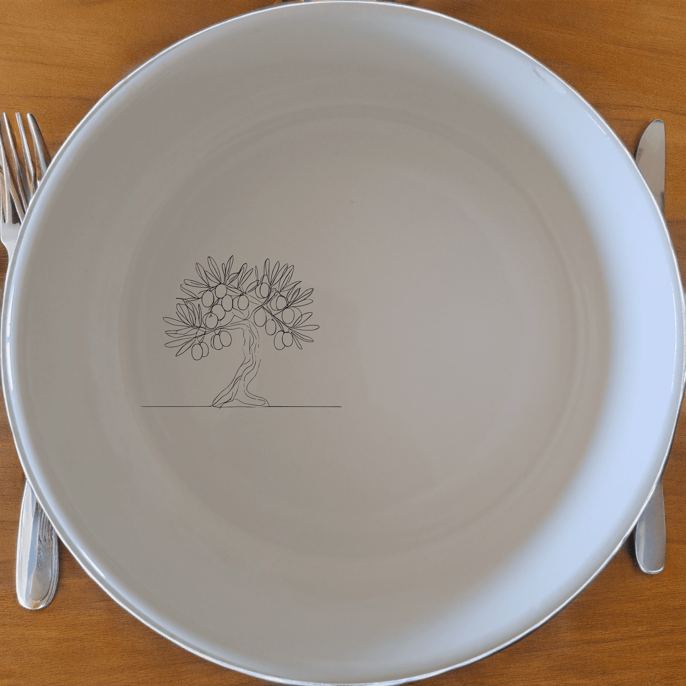 The Grecian Olive Tree Bowl Set of 4 features a delicate olive tree design, perfect for adding a touch of Mediterranean elegance to your dining experience.