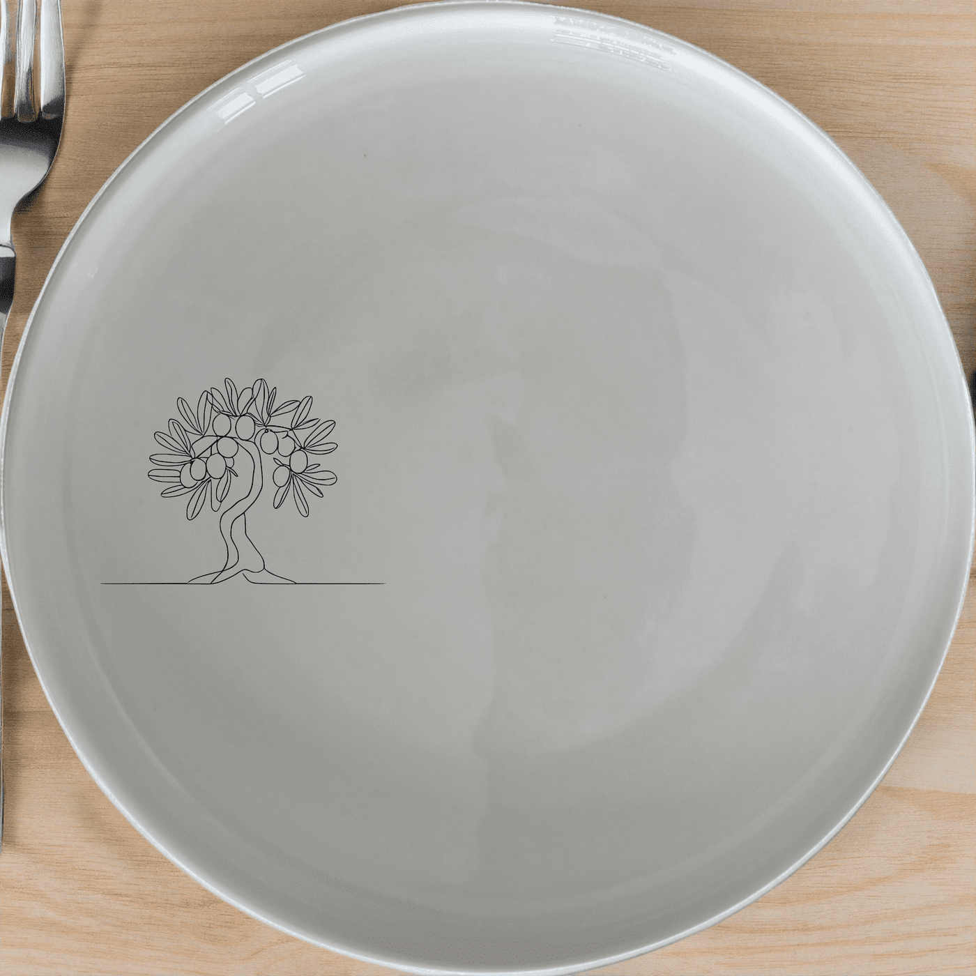 The Grecian Olive Tree Dinner Plate Set of 4 adds a touch of Mediterranean elegance to your dining table with its classic olive tree design.