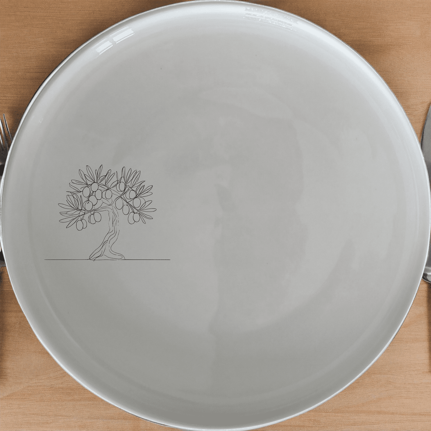 The Olive Tree Dinner Plate Set of 4 features a minimalist olive tree design, perfect for elevating your dining experience with a touch of nature.