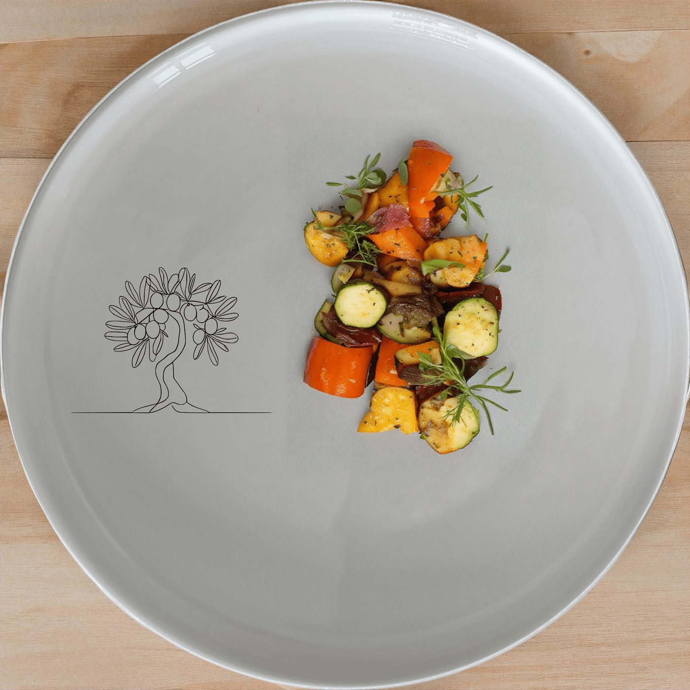 The Olive Tree Side Plate Set of 4 features a minimalist olive tree design, perfect for adding a touch of nature to your dining table.