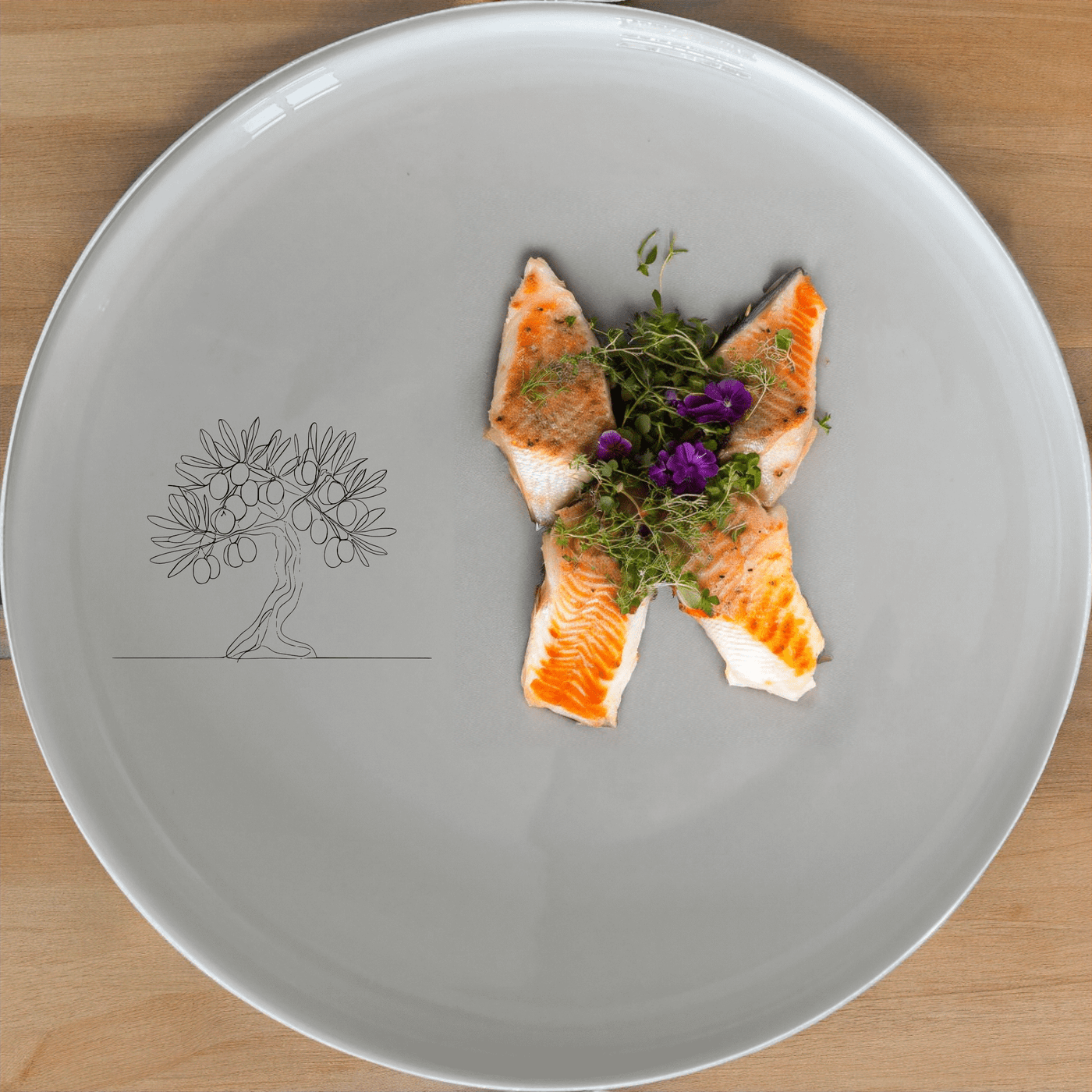 The Olive Tree Side Plate Set of 4 adds a touch of Mediterranean charm to your dining table with its elegant olive tree design.