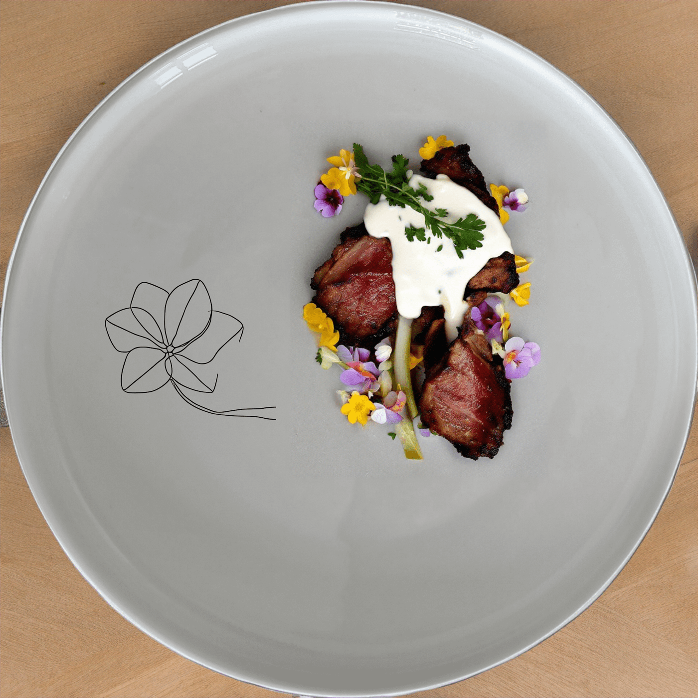 The Hoya Carnosa Dinner Plate Set of 4 features a delicate floral design, perfect for elevating any dining experience with its timeless elegance.