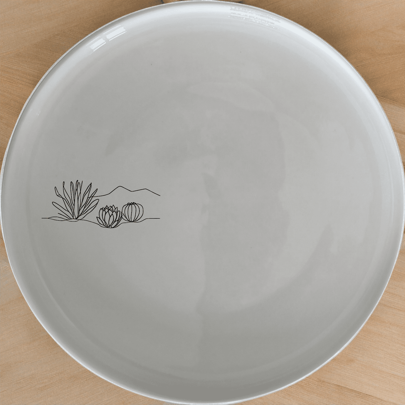 The Karoo Desert Landscape Succulent Plants Dinner Plate Set of 4 brings natural elegance to your dining table with minimalist artwork.