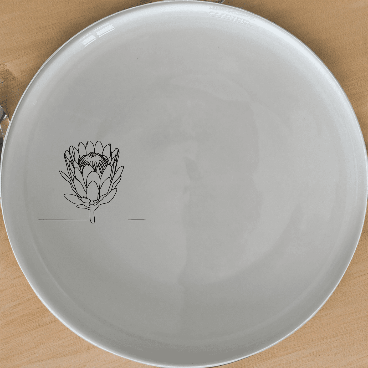 The King Protea Flower Side Plate Set of 4 features a delicate botanical illustration, perfect for adding a touch of nature to your dining table.