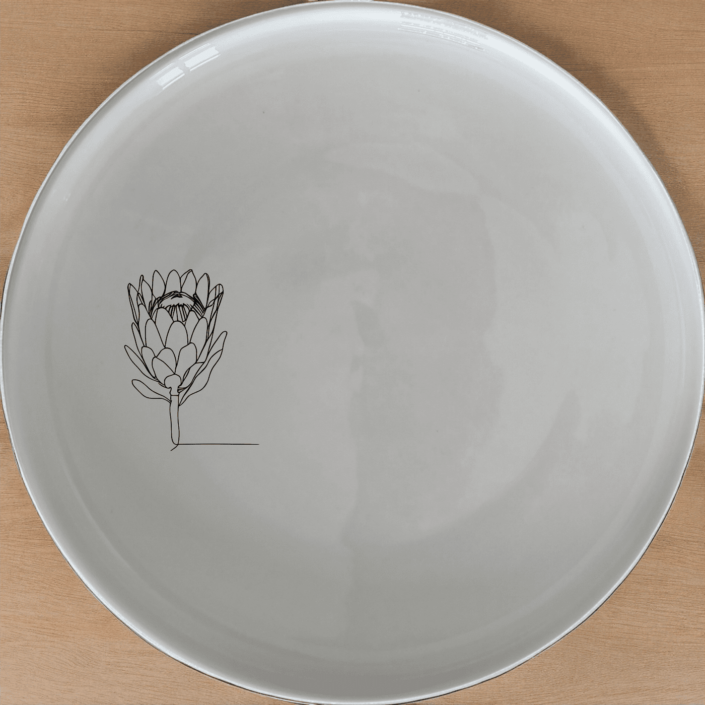 The King Protea Flower Side Plate Set of 4 features elegant botanical designs perfect for any dining table.