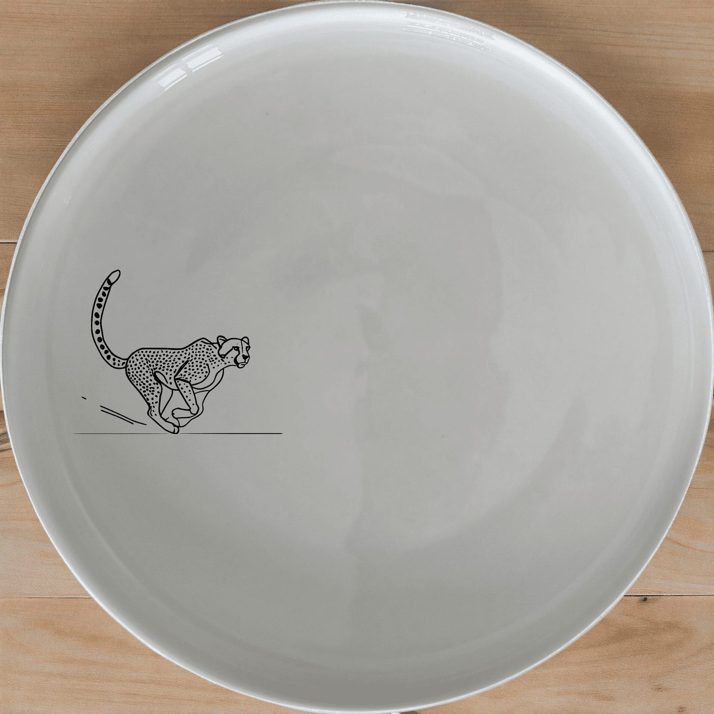 Running Cheeta Dinner Plate Set of 4 - Range 1 is a stunning set of four dinner plates featuring an elegant cheetah design, perfect for any dining occasion.