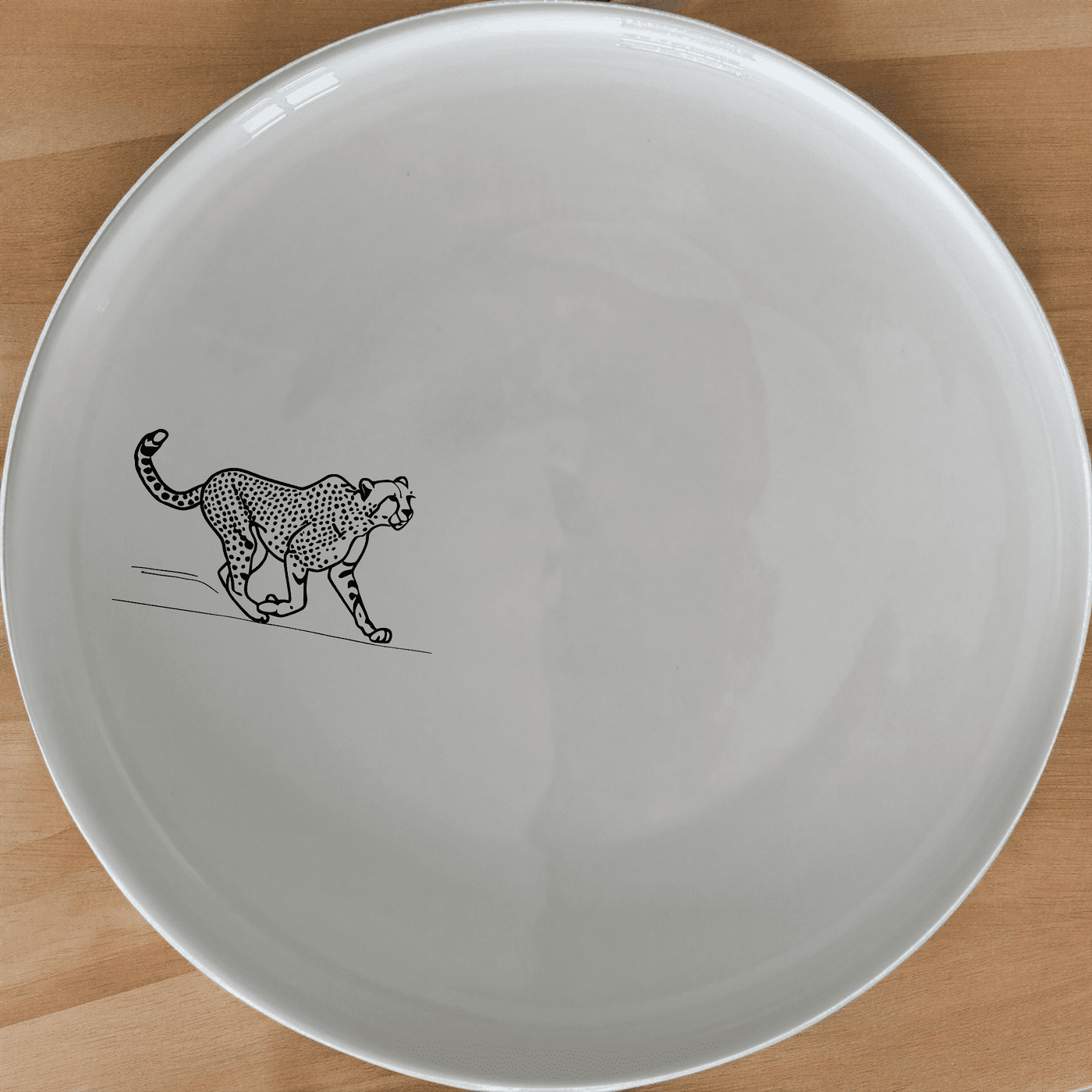 Running Cheeta Side Plate Set of 4 - Range 3 is a stylish and modern addition to any dining set, featuring a sleek cheetah design.