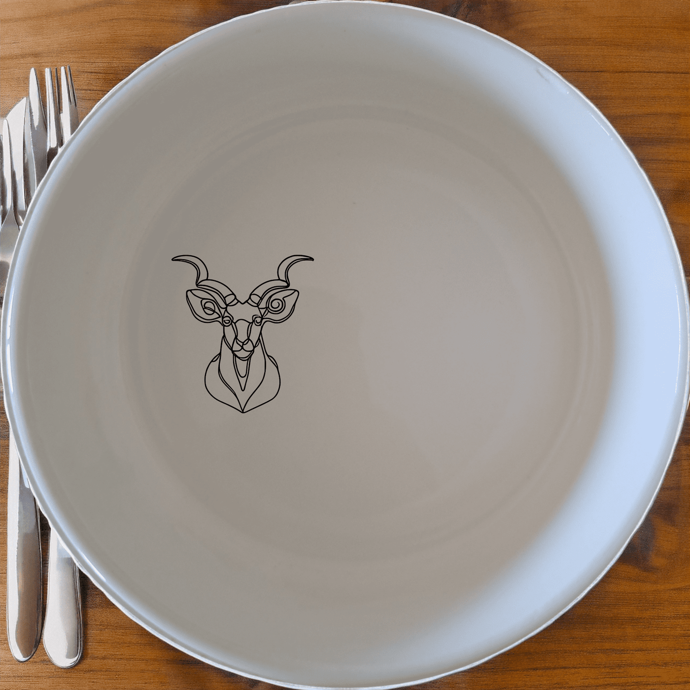 The Kudu Spiral Horns Majestic Bowl Set of 4 features elegant wildlife artistry, perfect for adding a touch of nature to your dining experience.