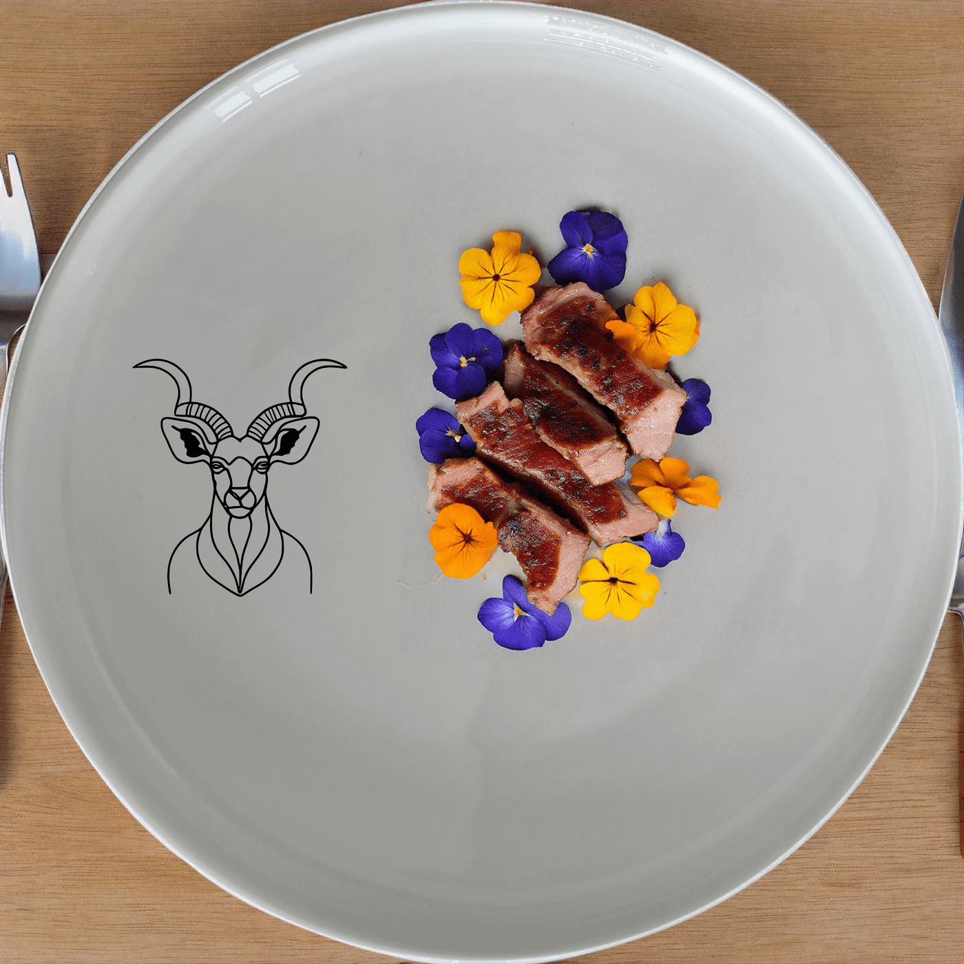 The Majestic Kudu Spiral Horns Dinner Plate Set of 4 adds a touch of wildlife elegance to your dining table with its sleek design and high-quality ceramic construction.
