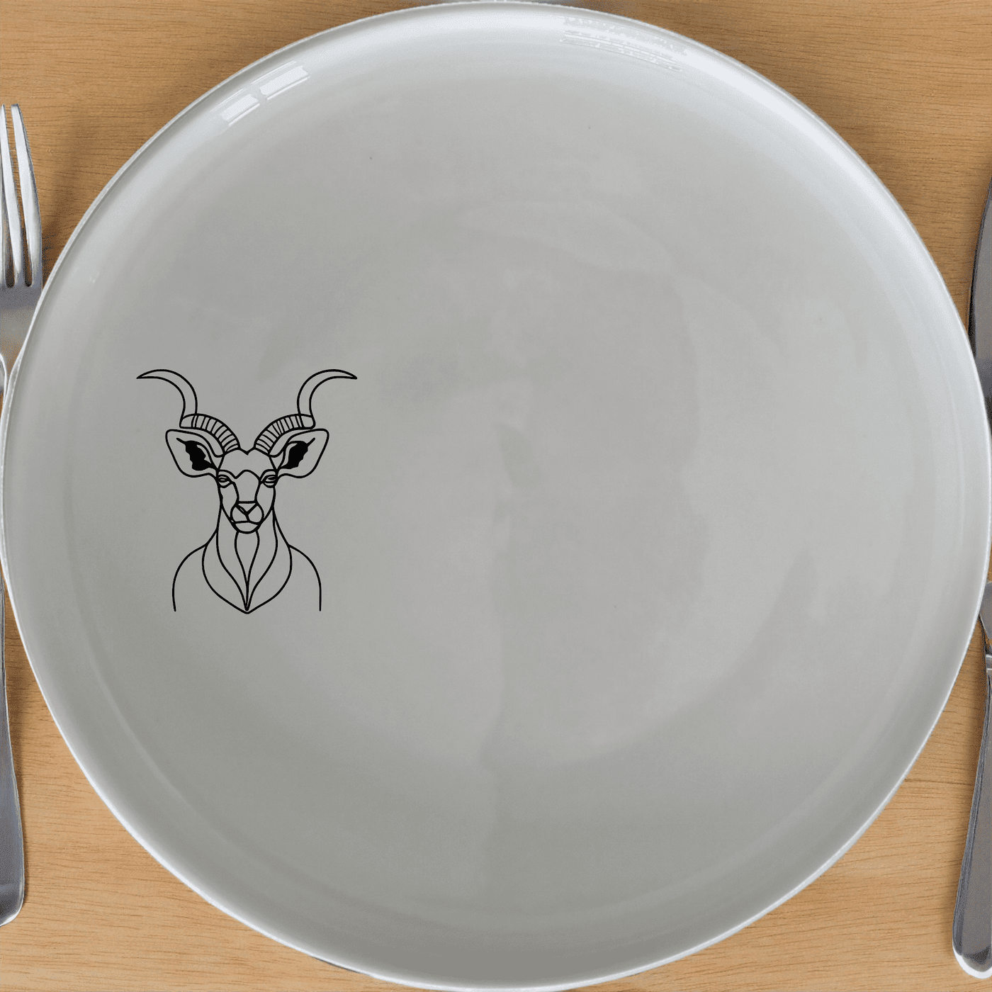 The Majestic Kudu Spiral Horns Side Plate Set of 4 features elegant laser-etched designs for a sophisticated touch to your dining experience.