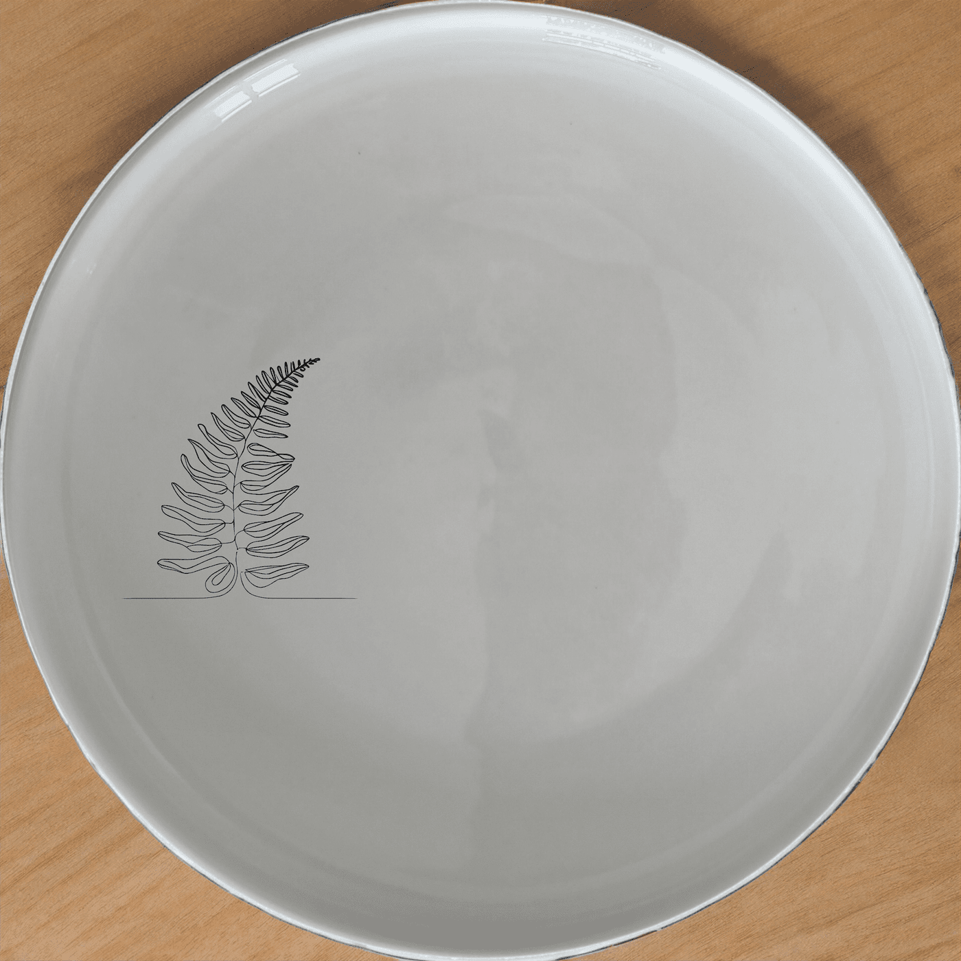 Layered Fern Fronds Dinner Plate Set of 4 adds a touch of nature to your dining table with its elegant fern design.