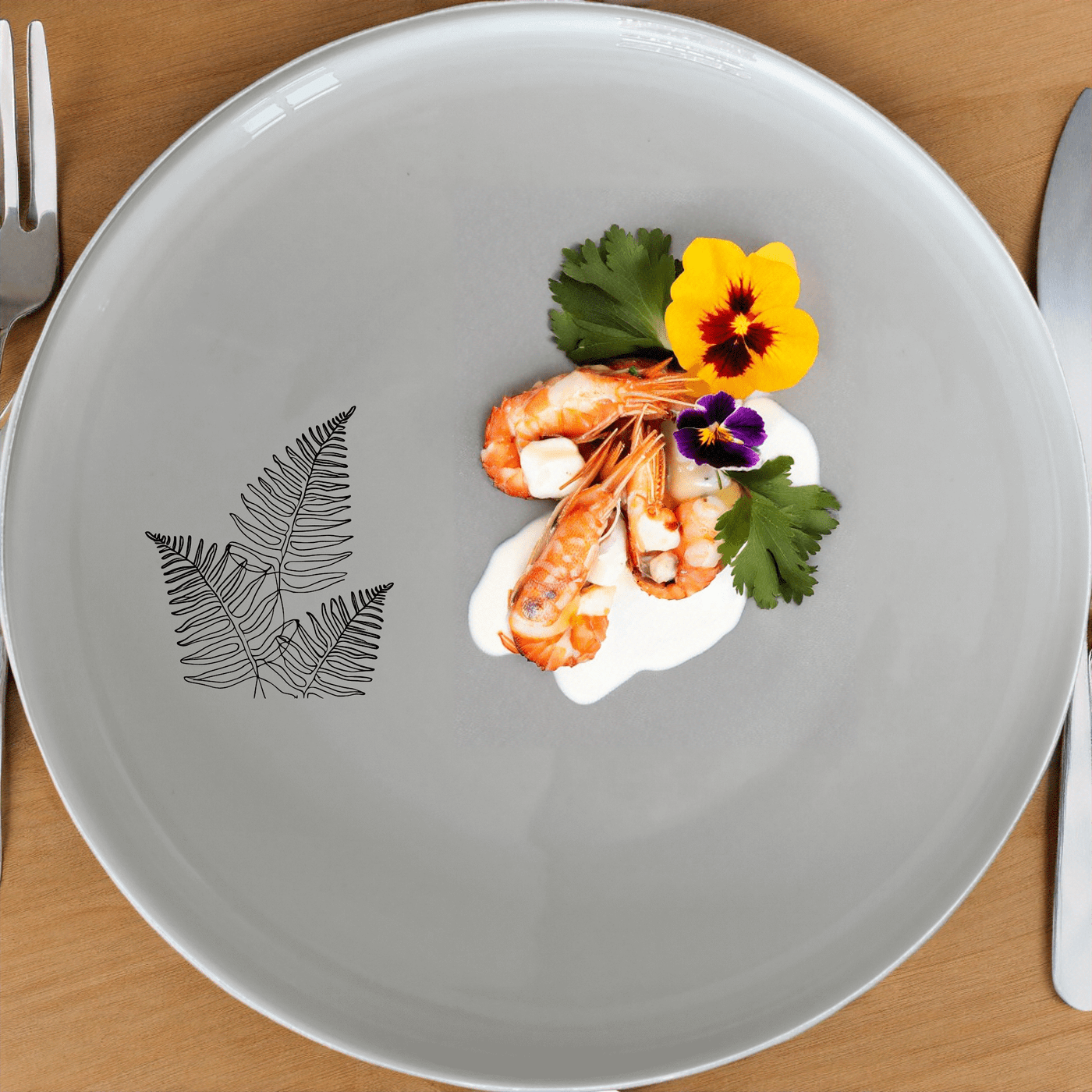 The Layered Fern Fronds Side Plate Set of 4 adds a touch of nature to your dining table with its elegant fern design.