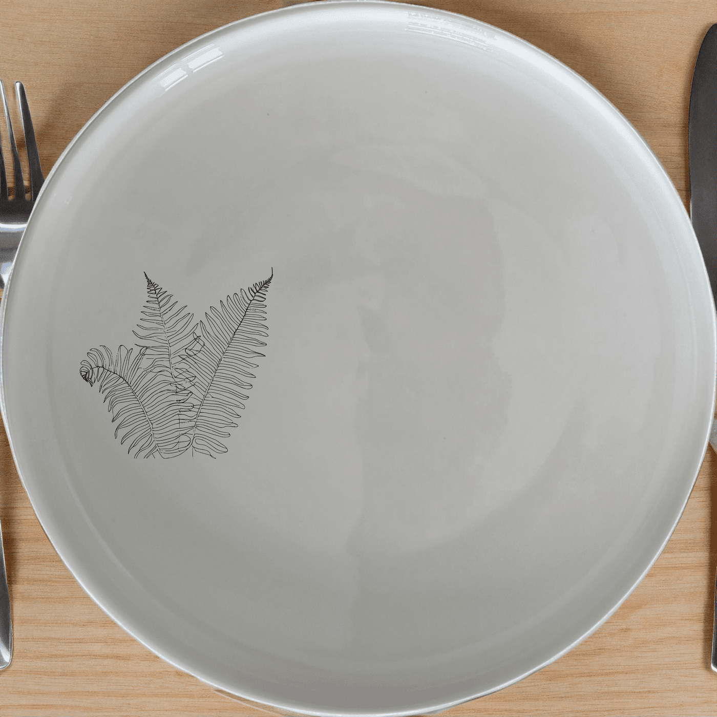 Layered Fern Fronds Side Plate Set of 4 adds a touch of nature to your dining table with intricate fern designs.