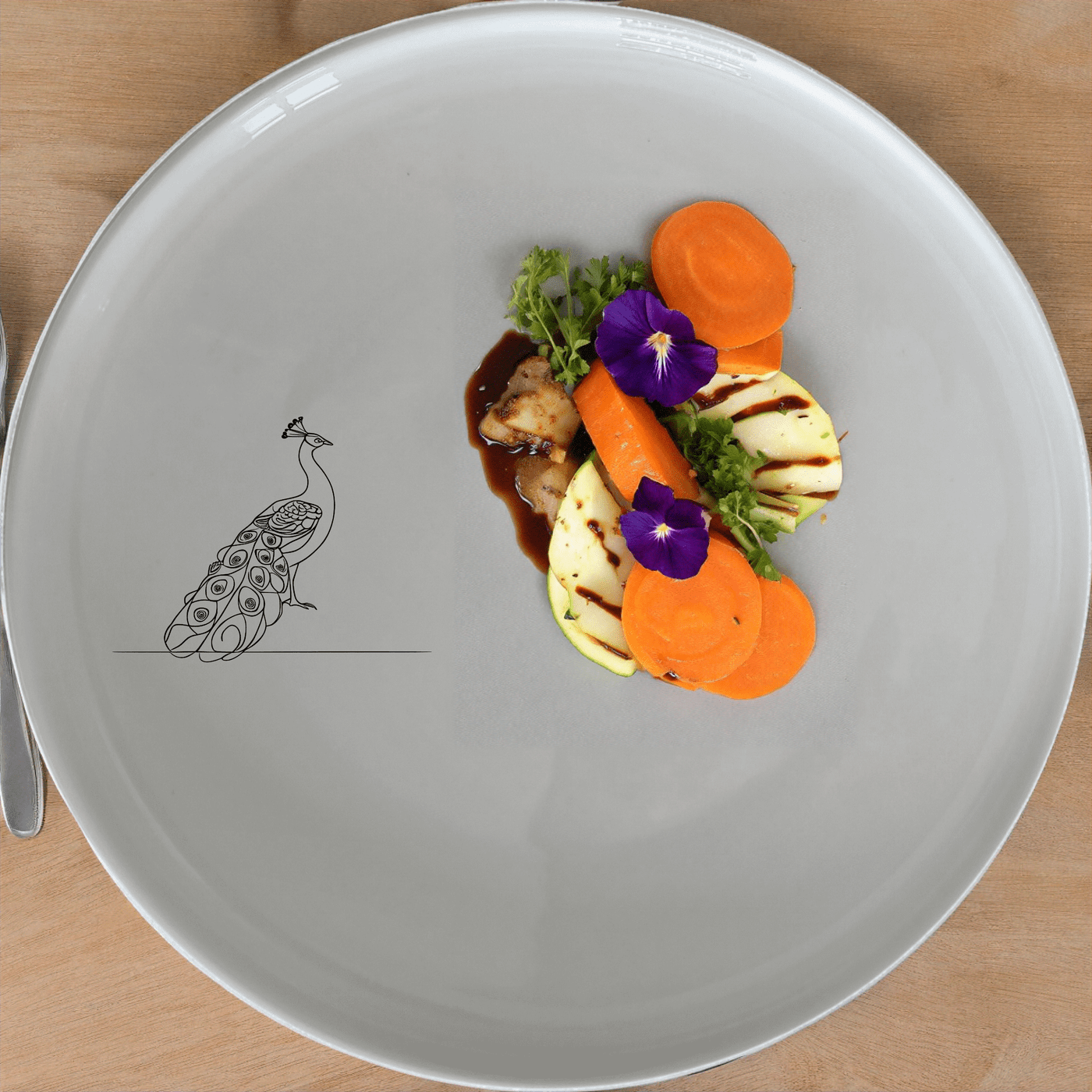 The Male Peacock Dinner Plate Set of 4 features a striking design perfect for any dining table. Crafted from premium ceramic, these plates are both stylish and durable.