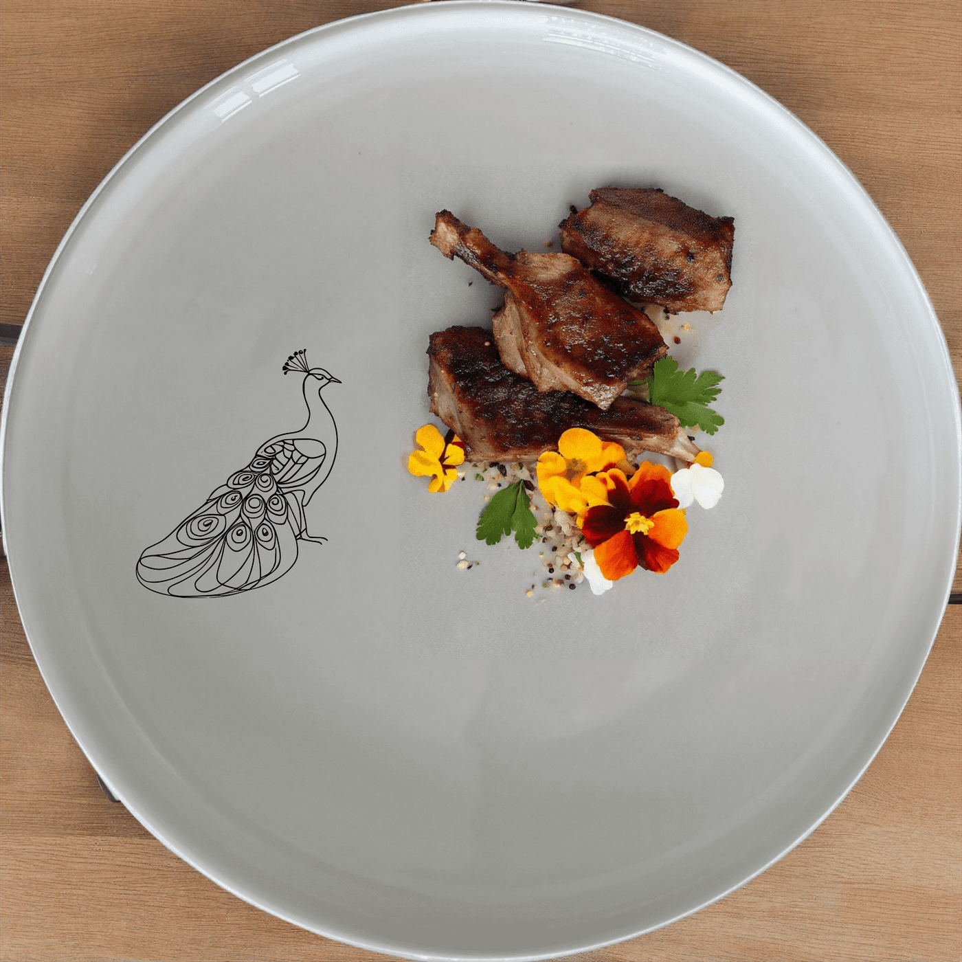 The Male Peacock Side Plate Set of 4 features an elegant design perfect for any dining table. This set includes four white ceramic plates with a subtle peacock motif, ideal for both everyday use and special occasions.