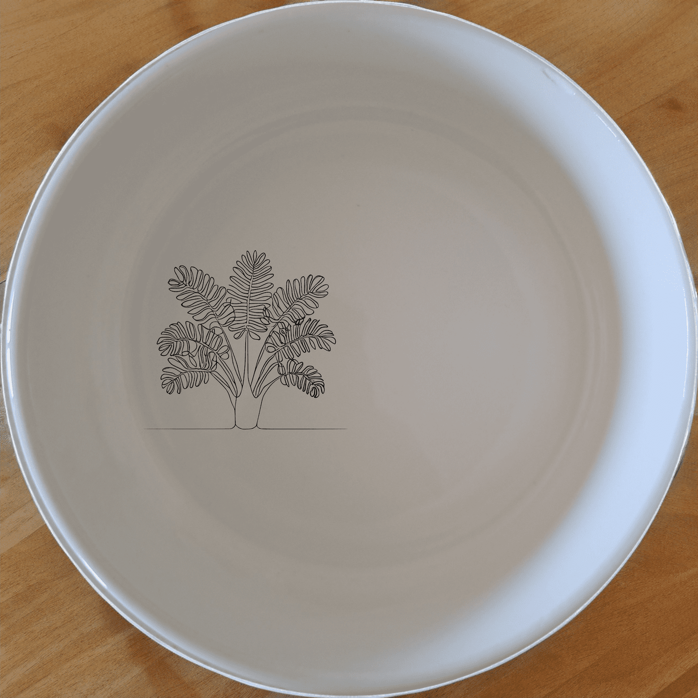 The Maximalism Cycads Bowl Set of 4 brings a touch of nature to your dining table with its elegant, minimalist design featuring cycad illustrations.