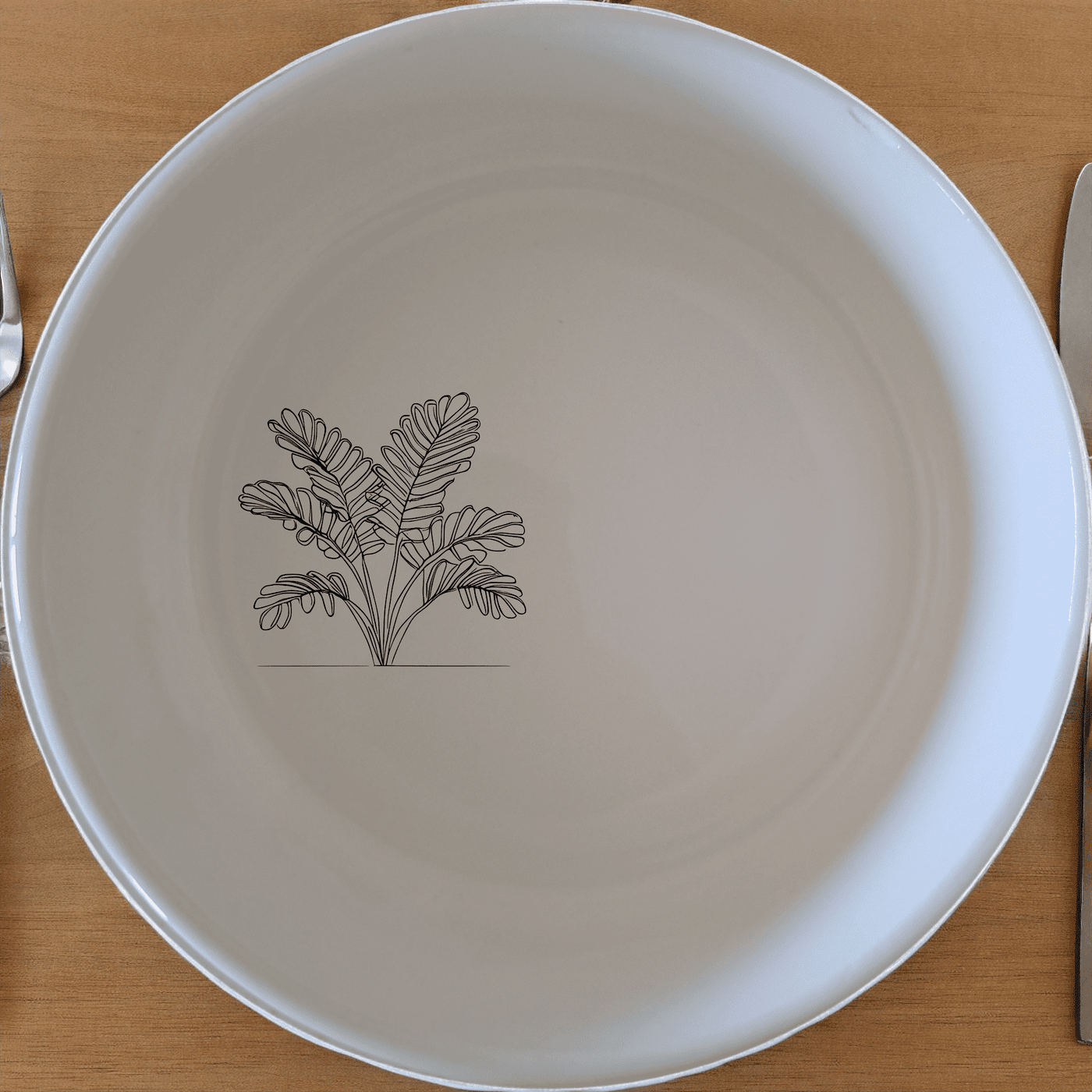 Maximalism Cycads Bowl Set of 4 adds a touch of modern elegance to your dining table with its unique design and high-quality ceramic construction.