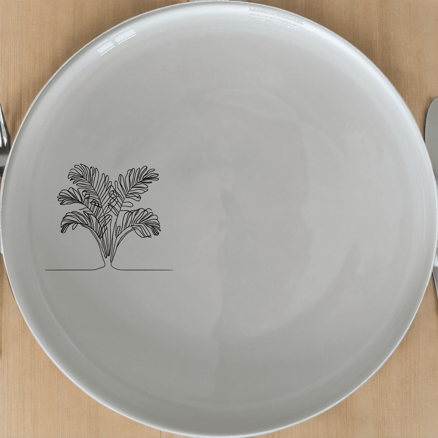The Maximalism Cycads Side Plate Set of 4 brings artistic flair to your dining table with its sleek, modern design and abstract botanical illustration.
