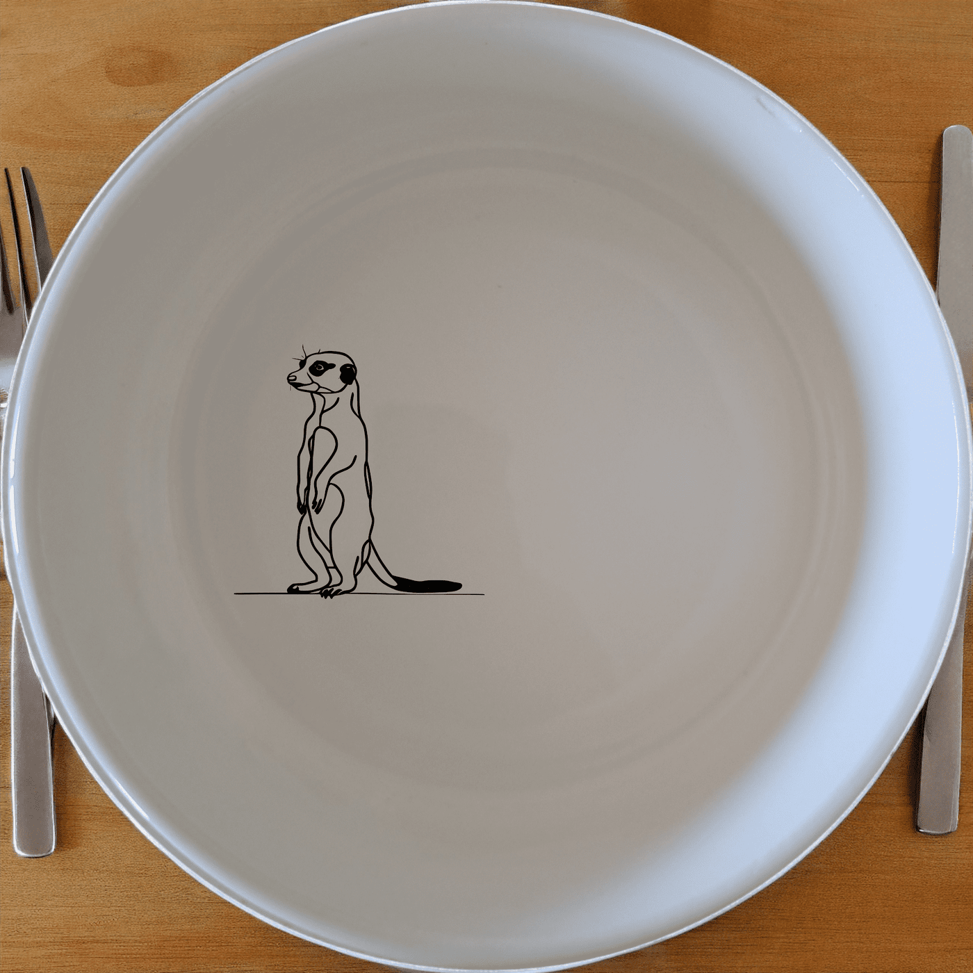 The Meerkat Standing Hind Legs Bowl Set of 4 adds a whimsical touch to your table setting with its charming design.
