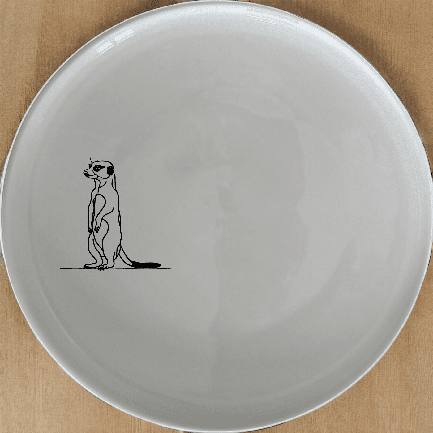 The Meerkat Standing Dinner Plate Set of 4 adds a whimsical touch to your dining table with its charming design.