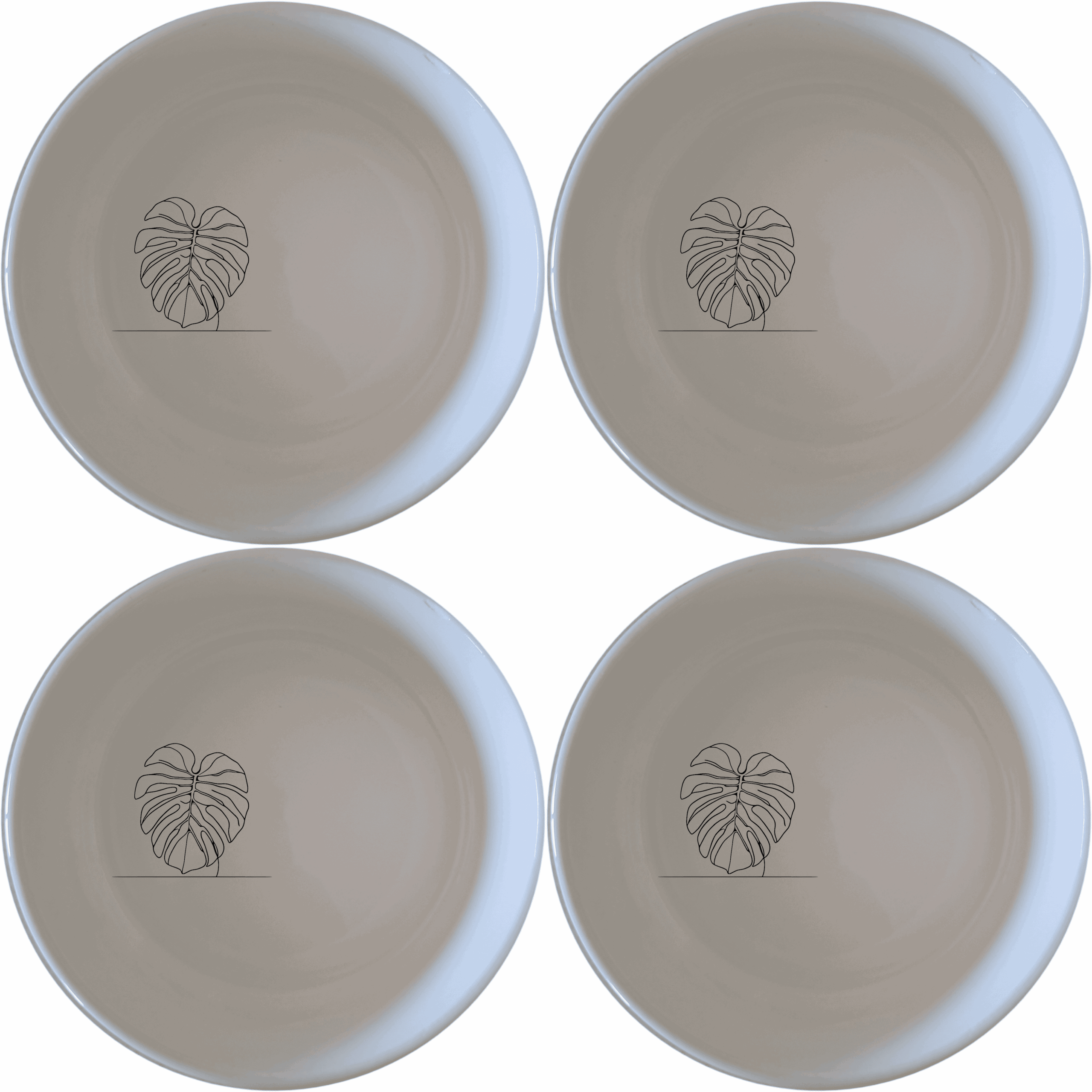 The Monstera Deliciosa Bowl Set of 4 features a modern, minimalist design with a subtle leaf motif, perfect for everyday use or special occasions.