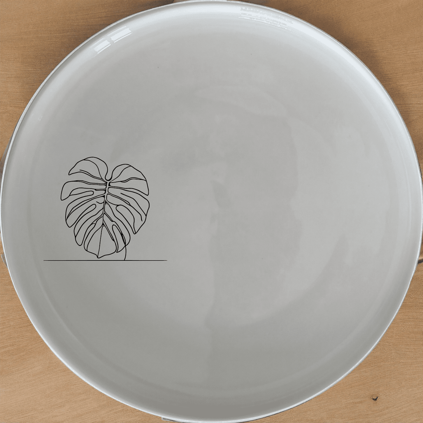 Monstera Deliciosa Side Plate Set of 4 features elegant laser-etched designs perfect for modern dining and everyday use.