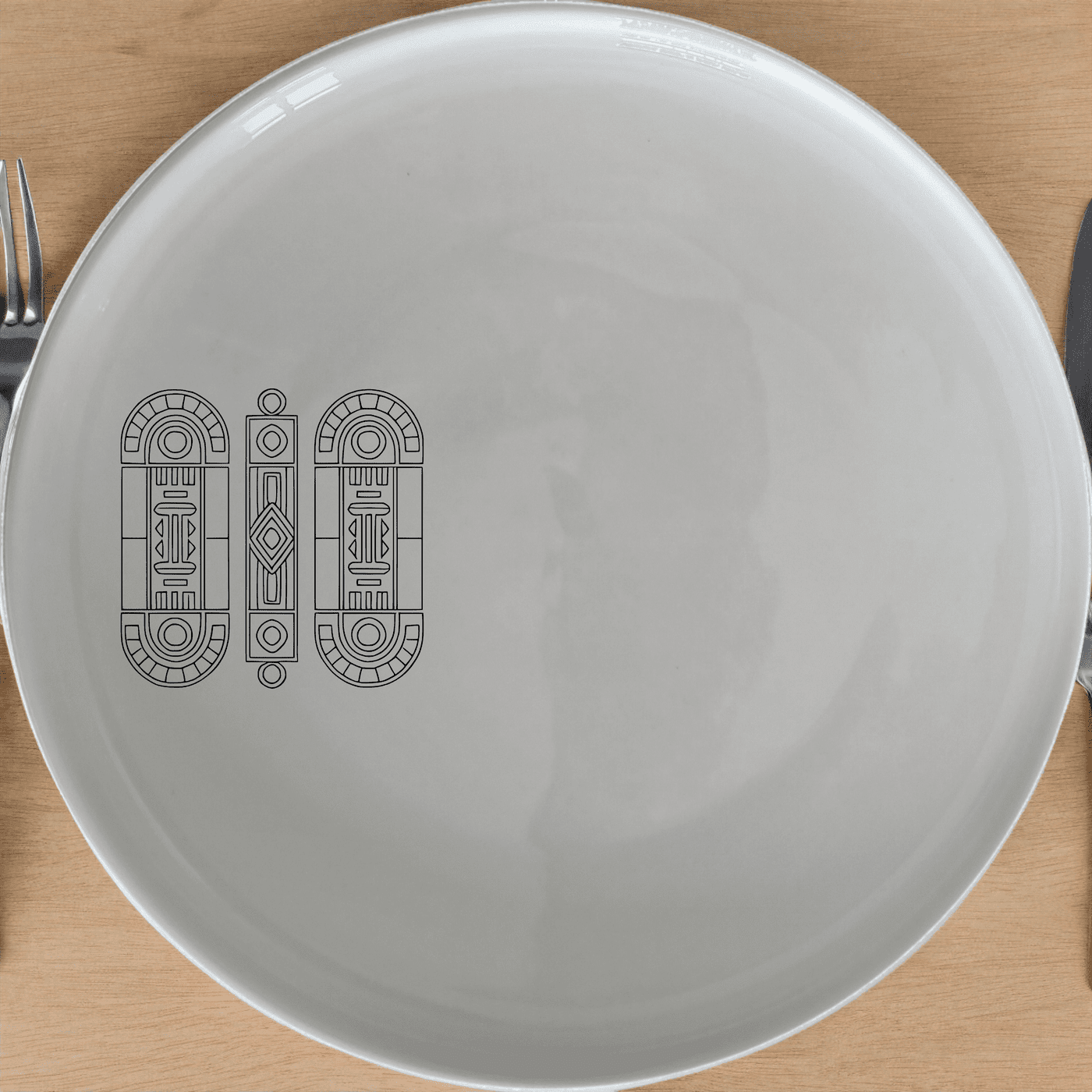 The Ndebele Pattern Design Side Plate Set of 4 features traditional African motifs in a modern, minimalist design, perfect for everyday use or special occasions.