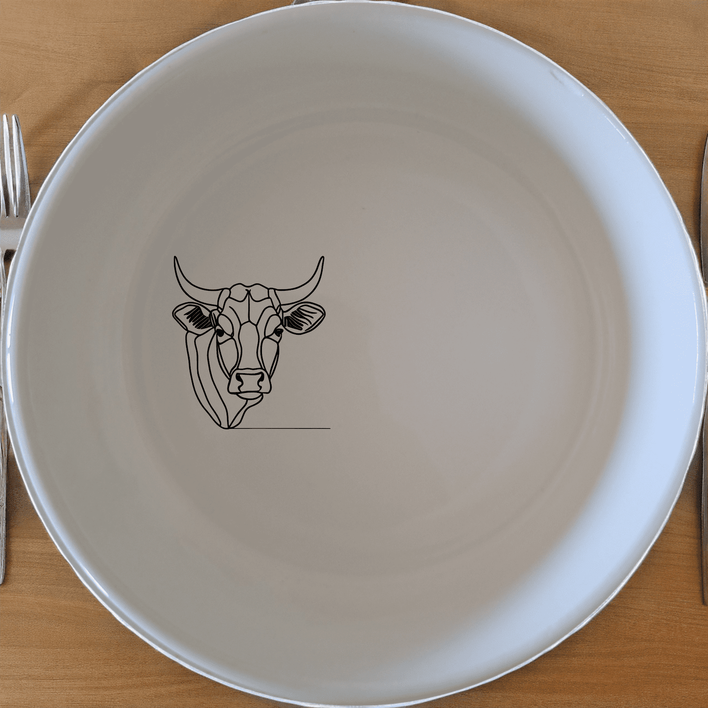 The Nguni Cattle Cow Head Bowl Set of 4 features a striking silhouette design, perfect for modern and rustic home decor.