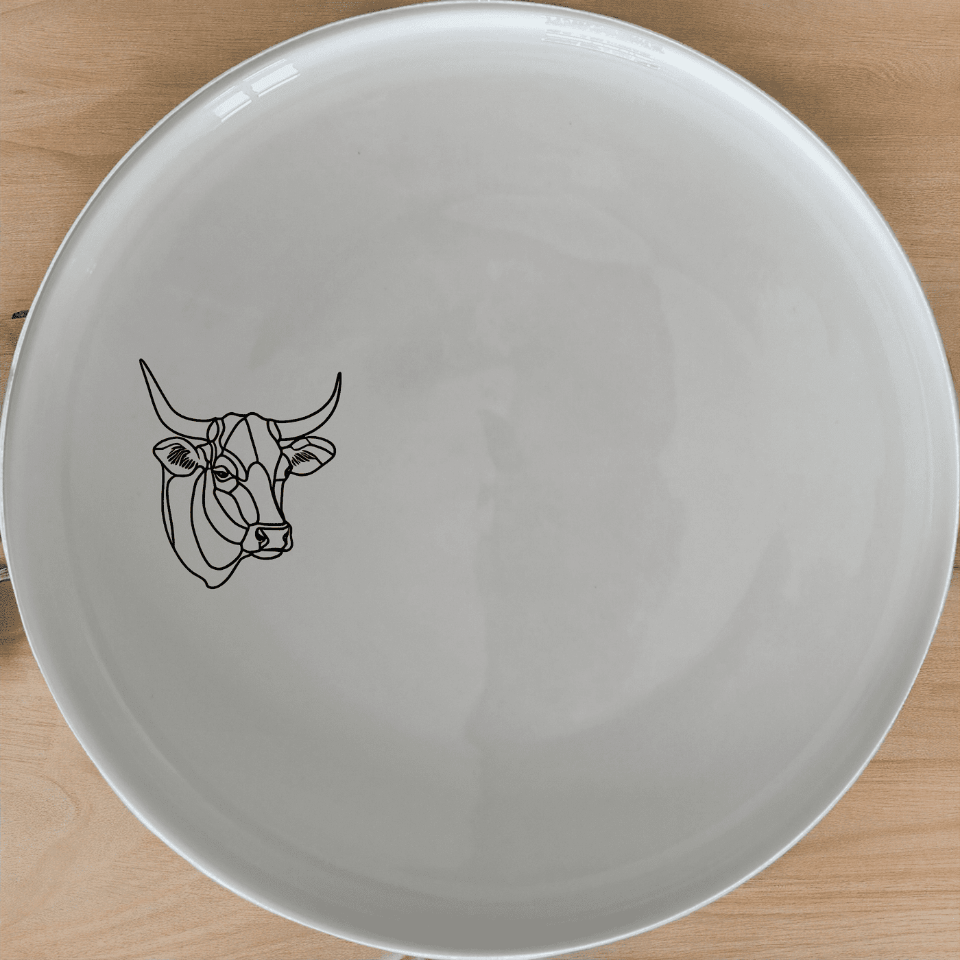 The Nguni Cattle Cow Head Side Plate Set of 4 is a unique and stylish addition to any dining table, perfect for those who appreciate African-inspired designs.