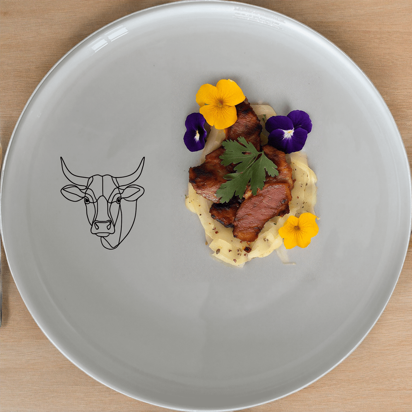 The Nguni Cattle Cow Head Side Plate Set of 4 features a striking silhouette design, perfect for modern and rustic home decors.