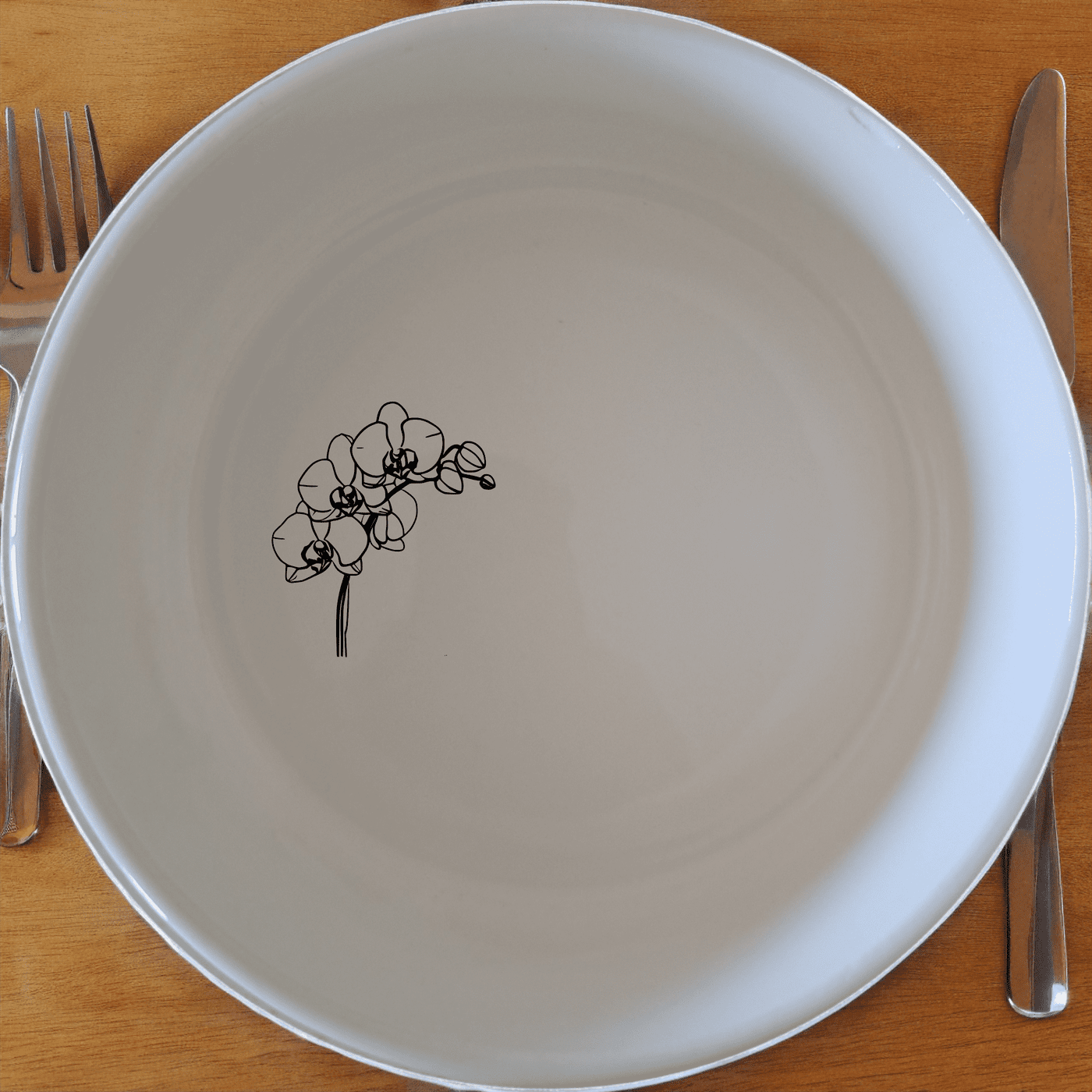 The Orchid Stems Bowl Set of 4 adds a touch of nature to your dining experience with delicate laser-etched designs.