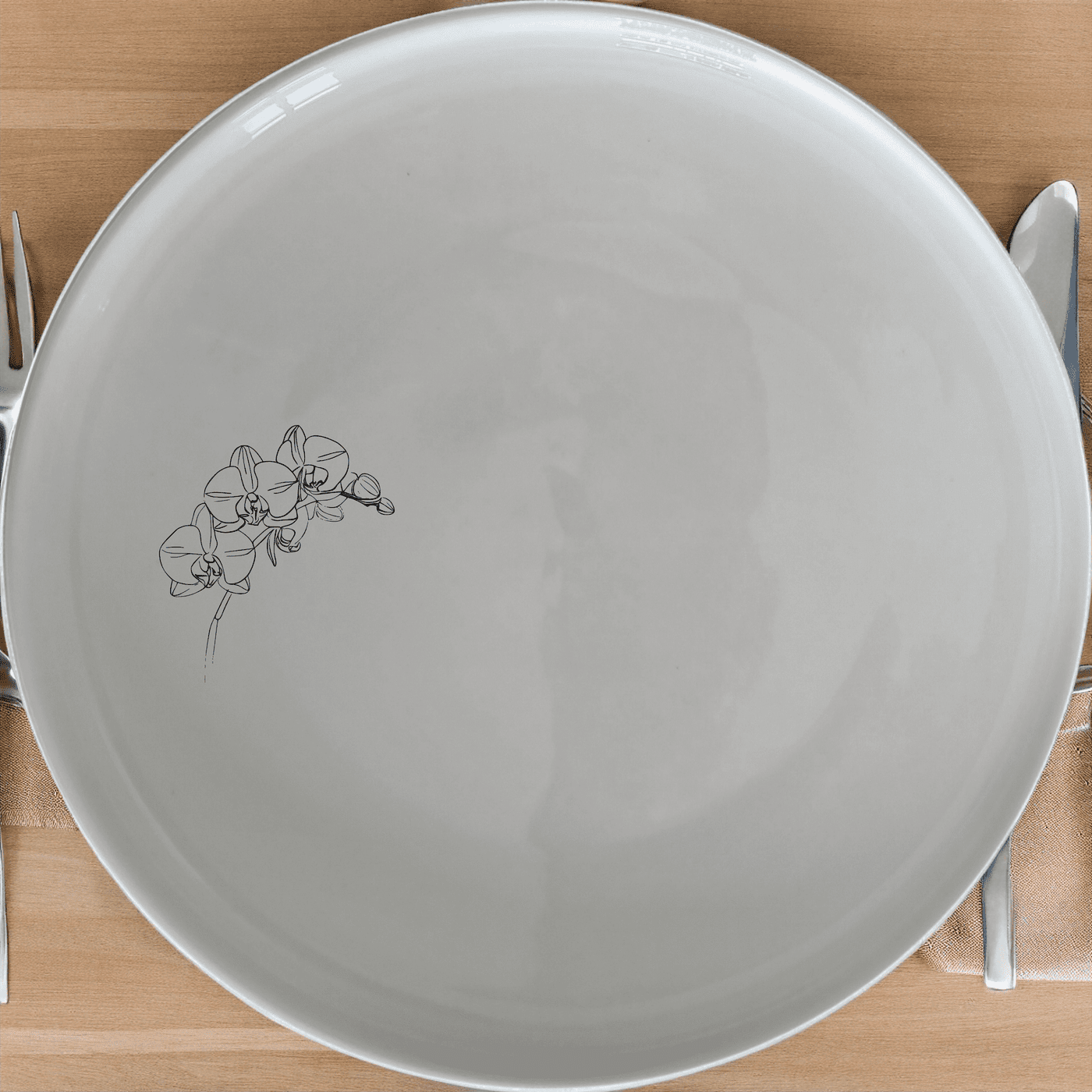 The Orchid Stems Dinner Plate Set of 4 features delicate laser-etched orchid designs on white ceramic plates, perfect for elevating any dining experience.