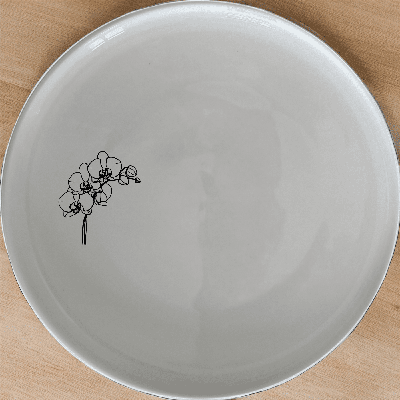 Orchid Stems Side Plate Set of 4 features delicate laser-etched designs on white ceramic plates, perfect for modern dining.